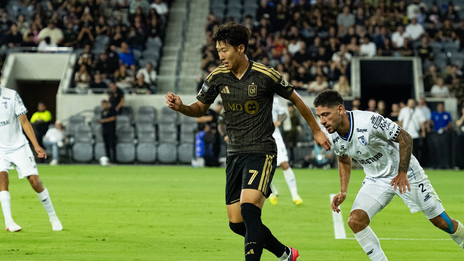 Son Heung-Min skillfully dribbles past defenders