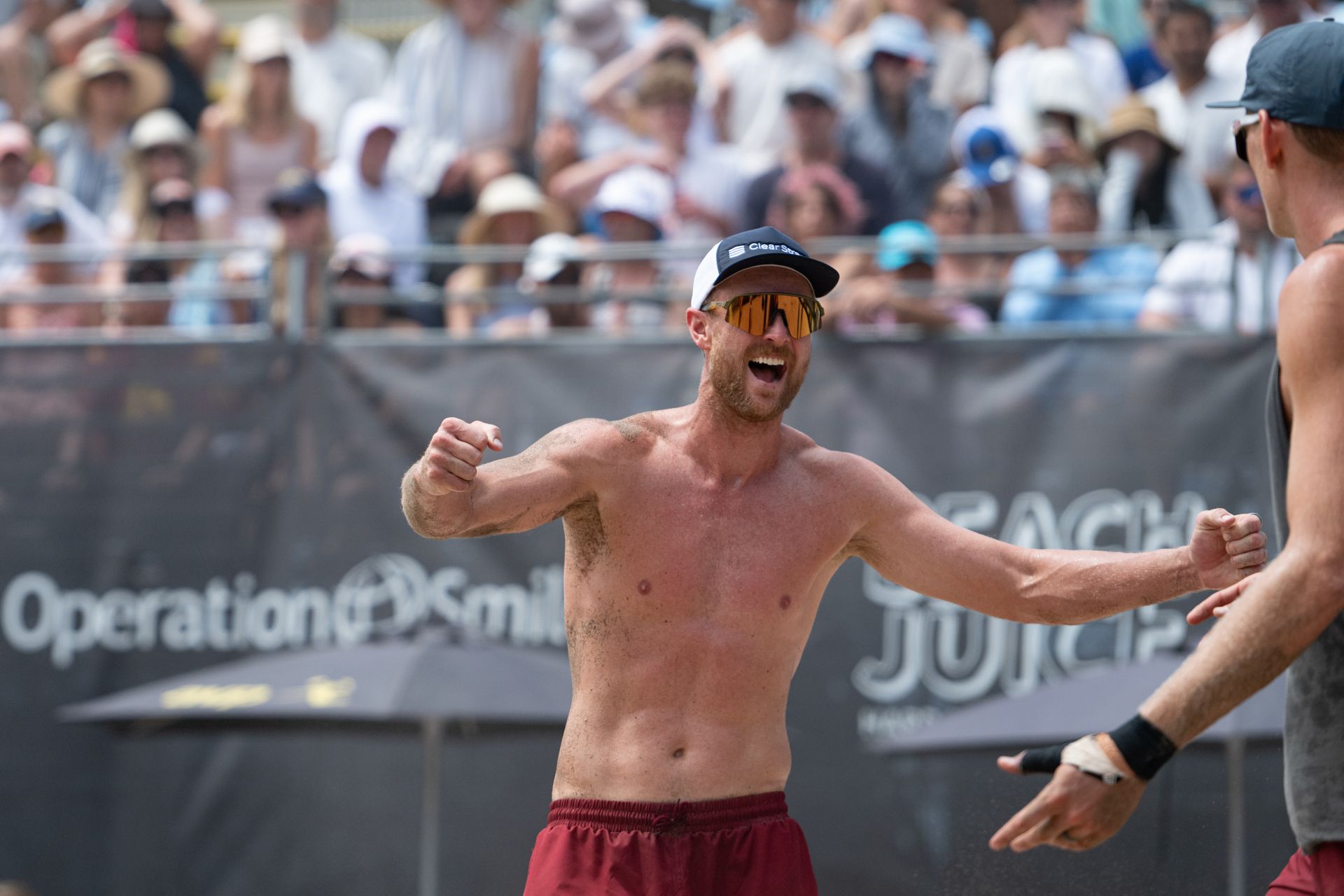 Paul Lotman celebrates a point win at Manhattan Beach Open