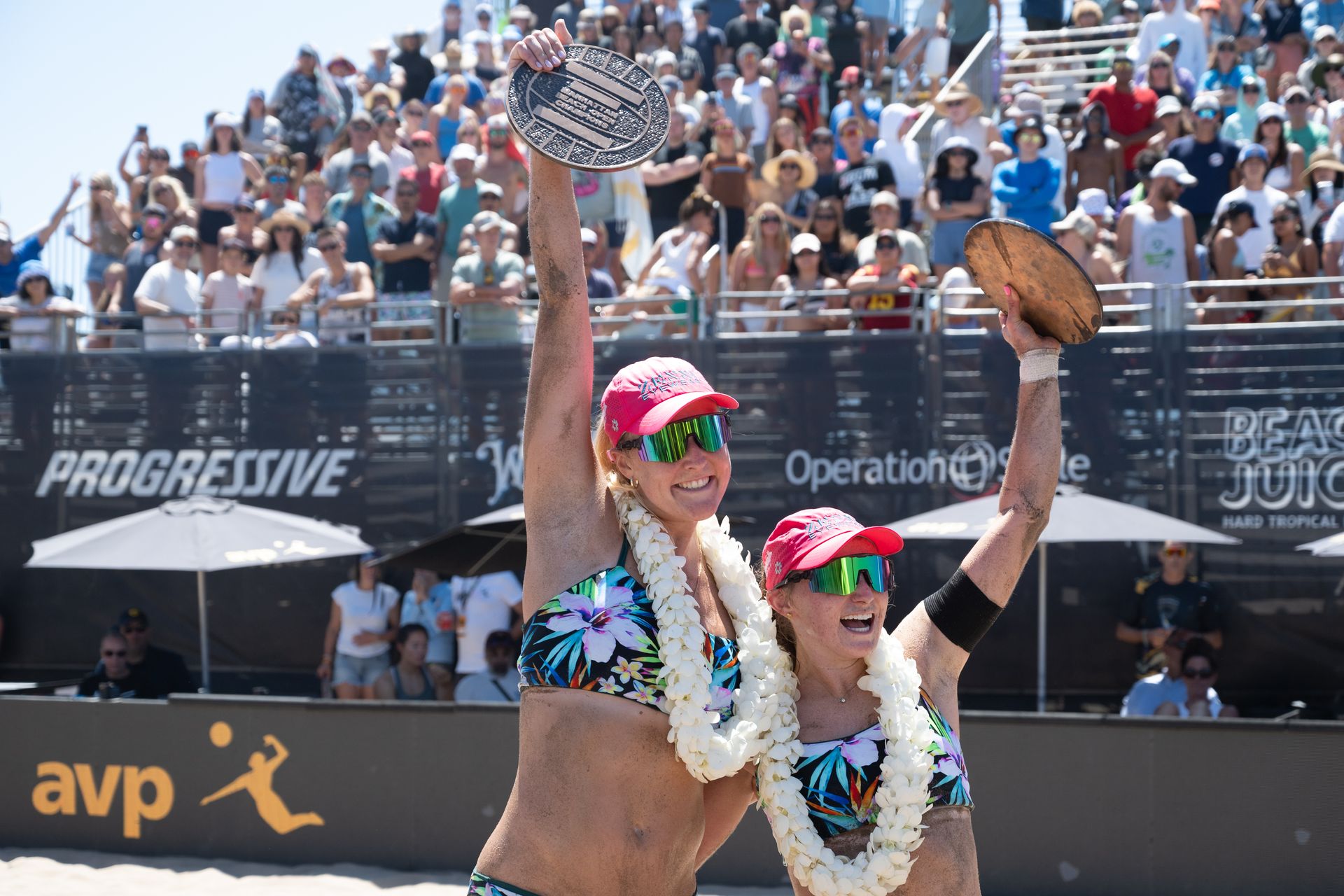 Taryn Brasher and Kristen Cruz with trophies after women's finals