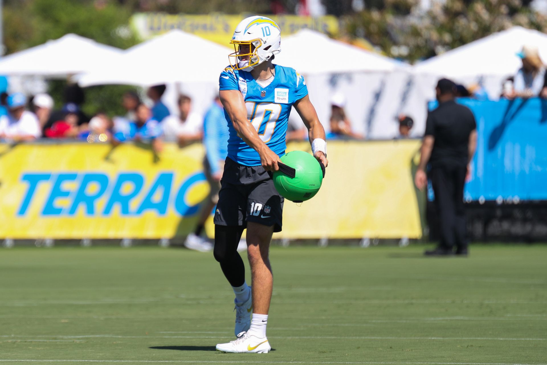 Justin Herbert #10 Participates in Drills at The Bolt