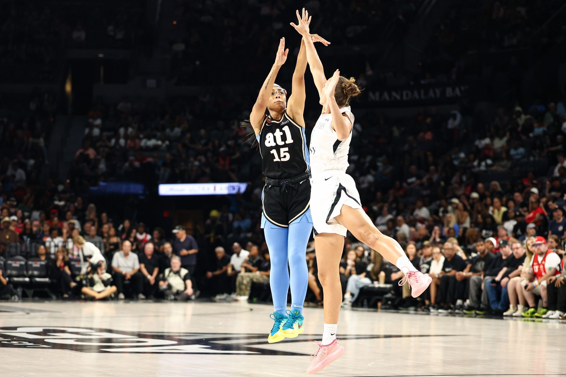 Angel Reese makes a floating shot over A'ja Wilson