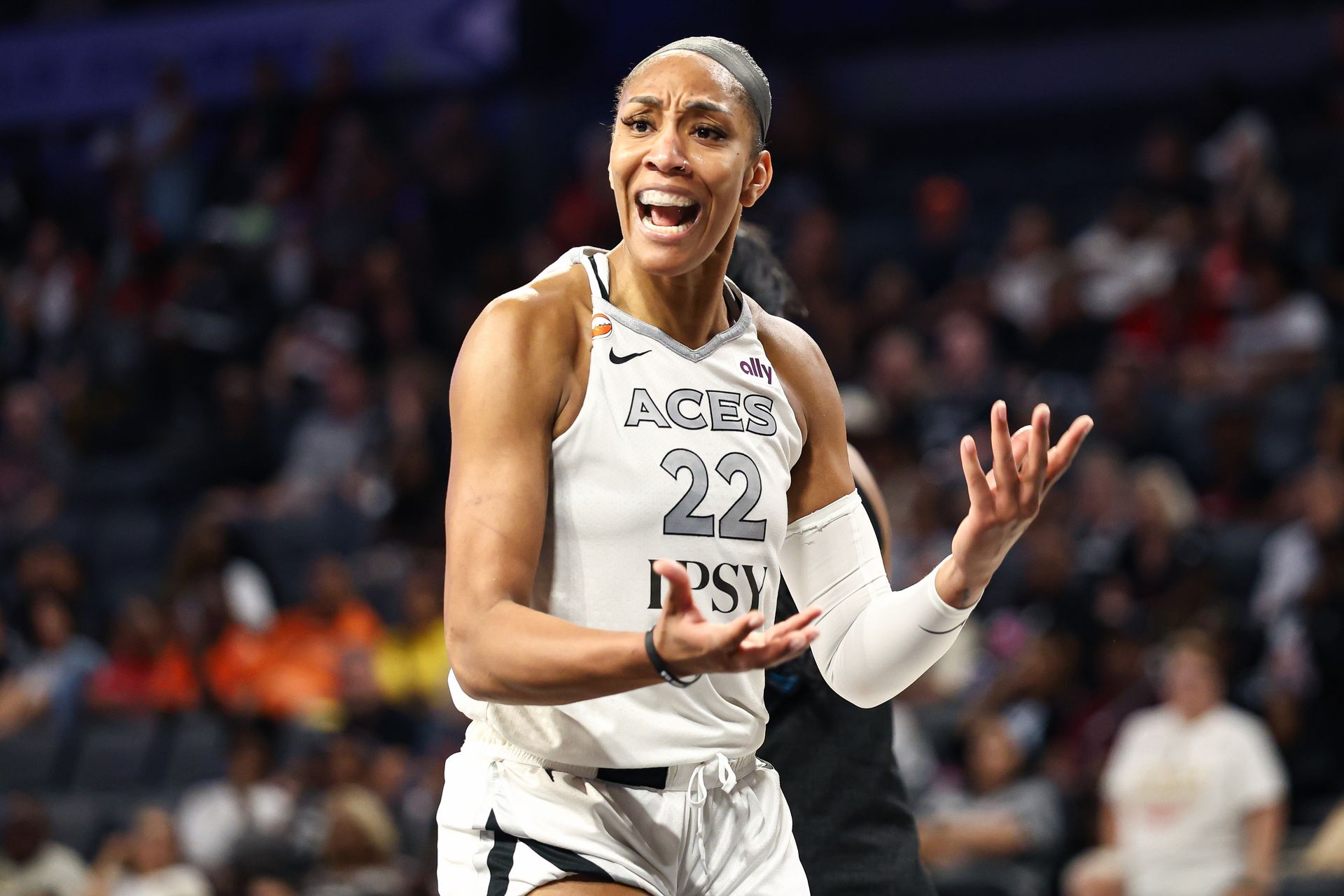 A'ja Wilson reacts to a foul call in a heated WNBA game