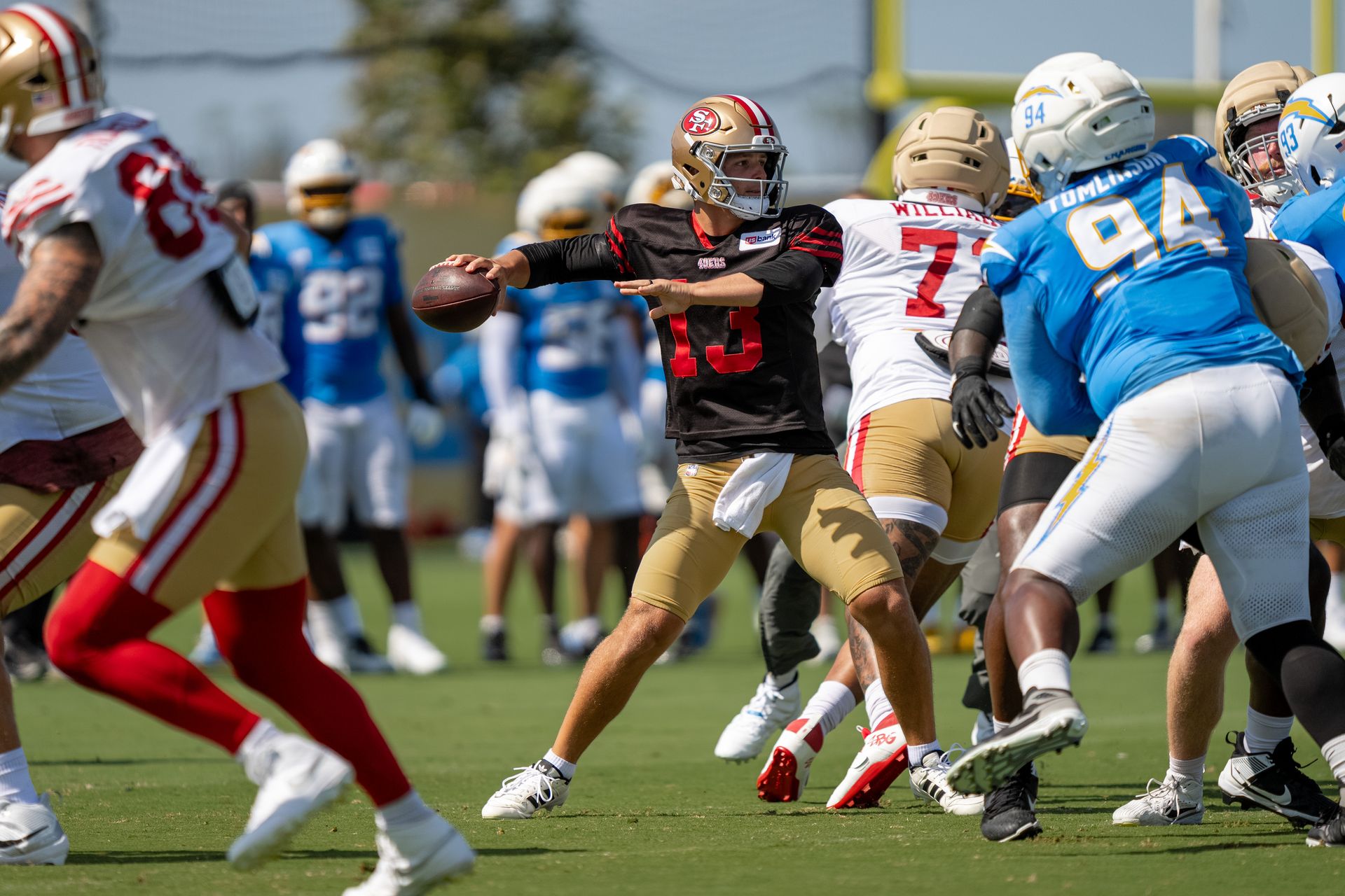 Brock Purdy passing the football at joint training camp