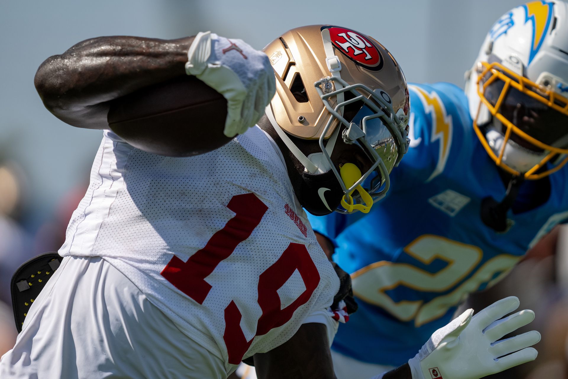 Deebo Samuel Sr. evades Cam Hart at joint training camp