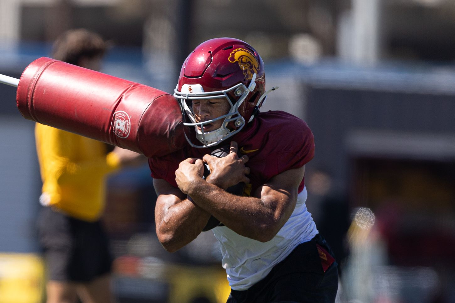 USC players in contact drills at Howard Jones Field