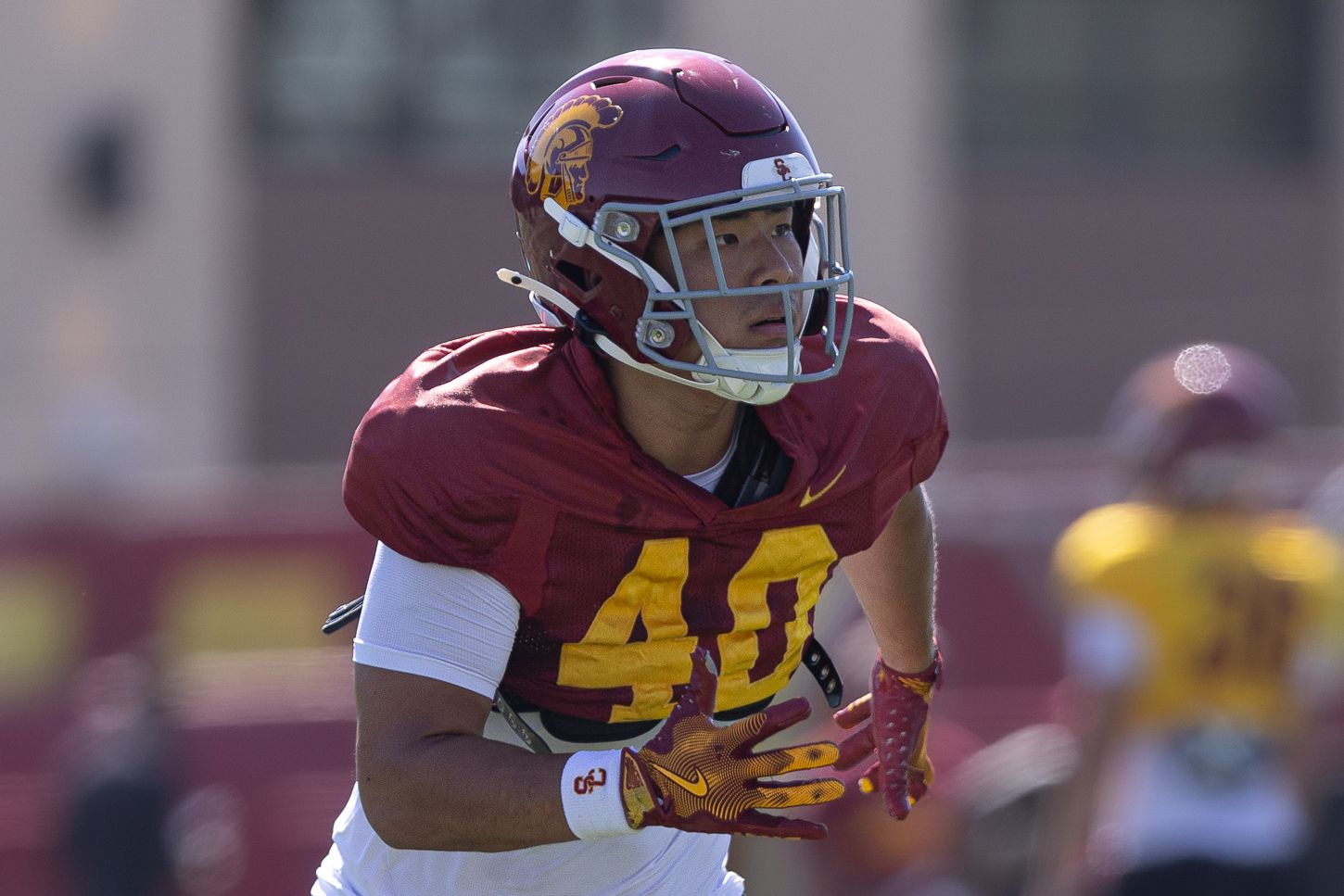 Marcus Sung runs drills at USC practice