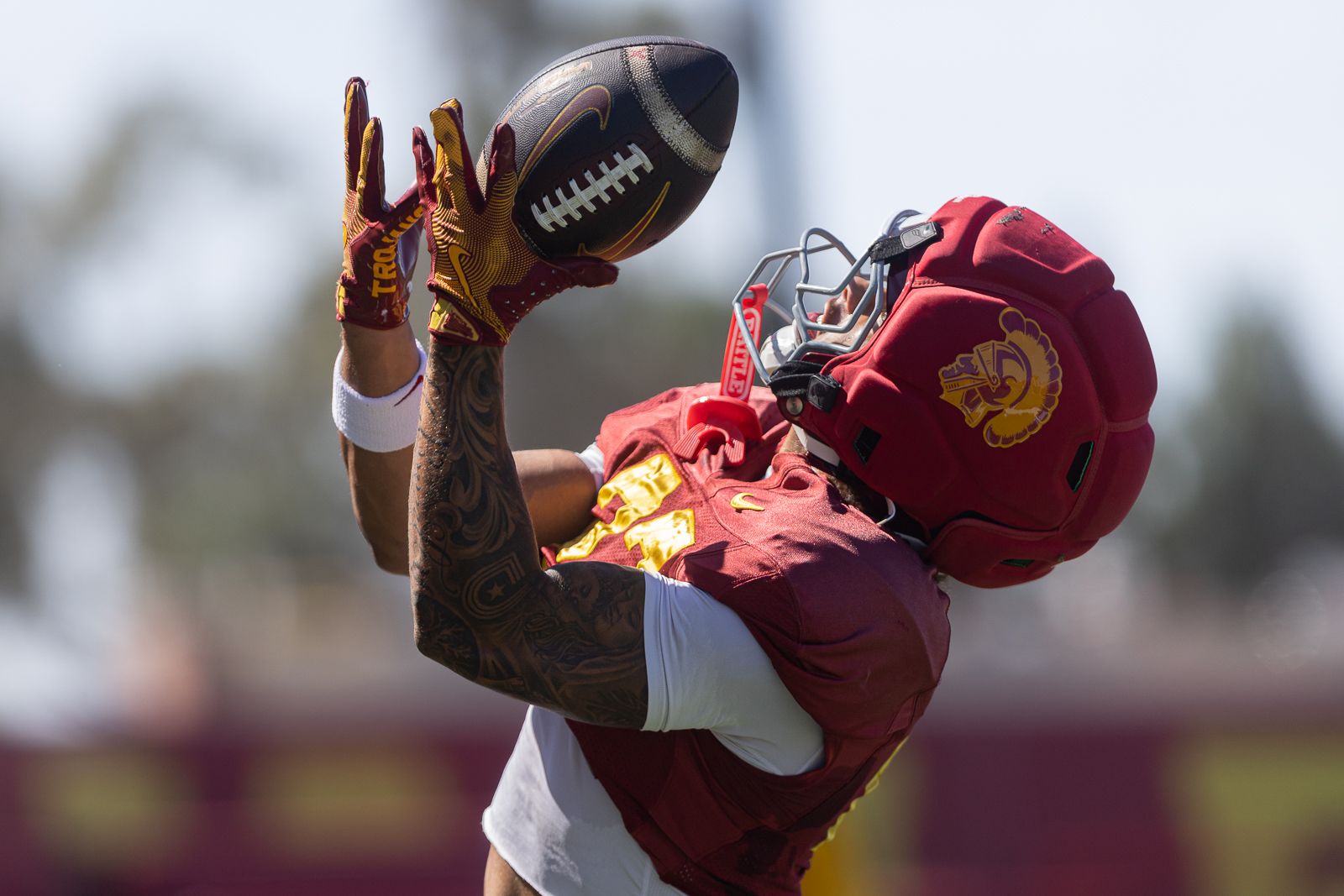 Riley Wormley catches a pass during USC practice