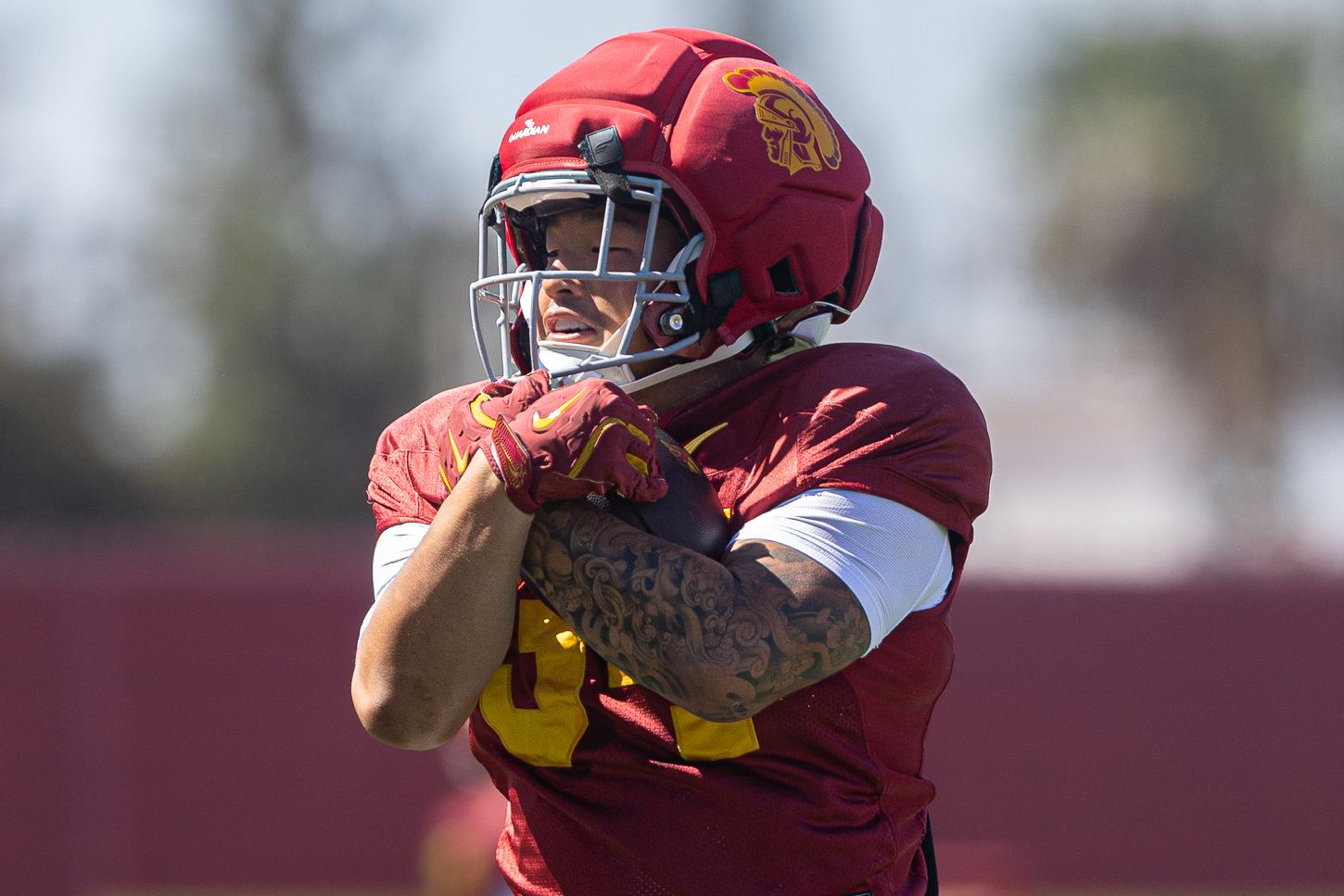 Tyson Park catches a pass during USC practice