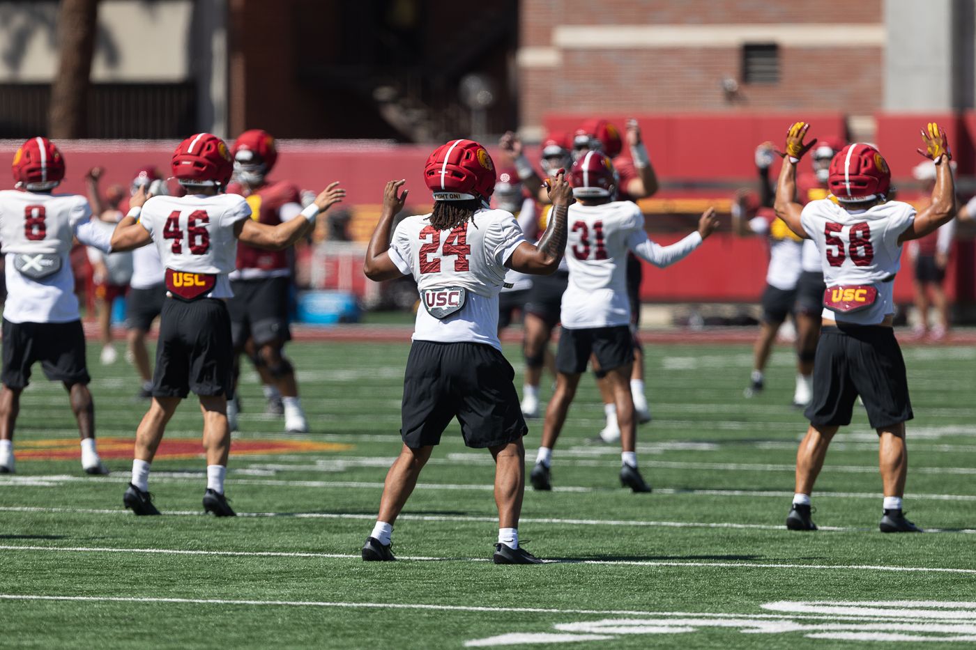USC players warm up at Howard Jones Field