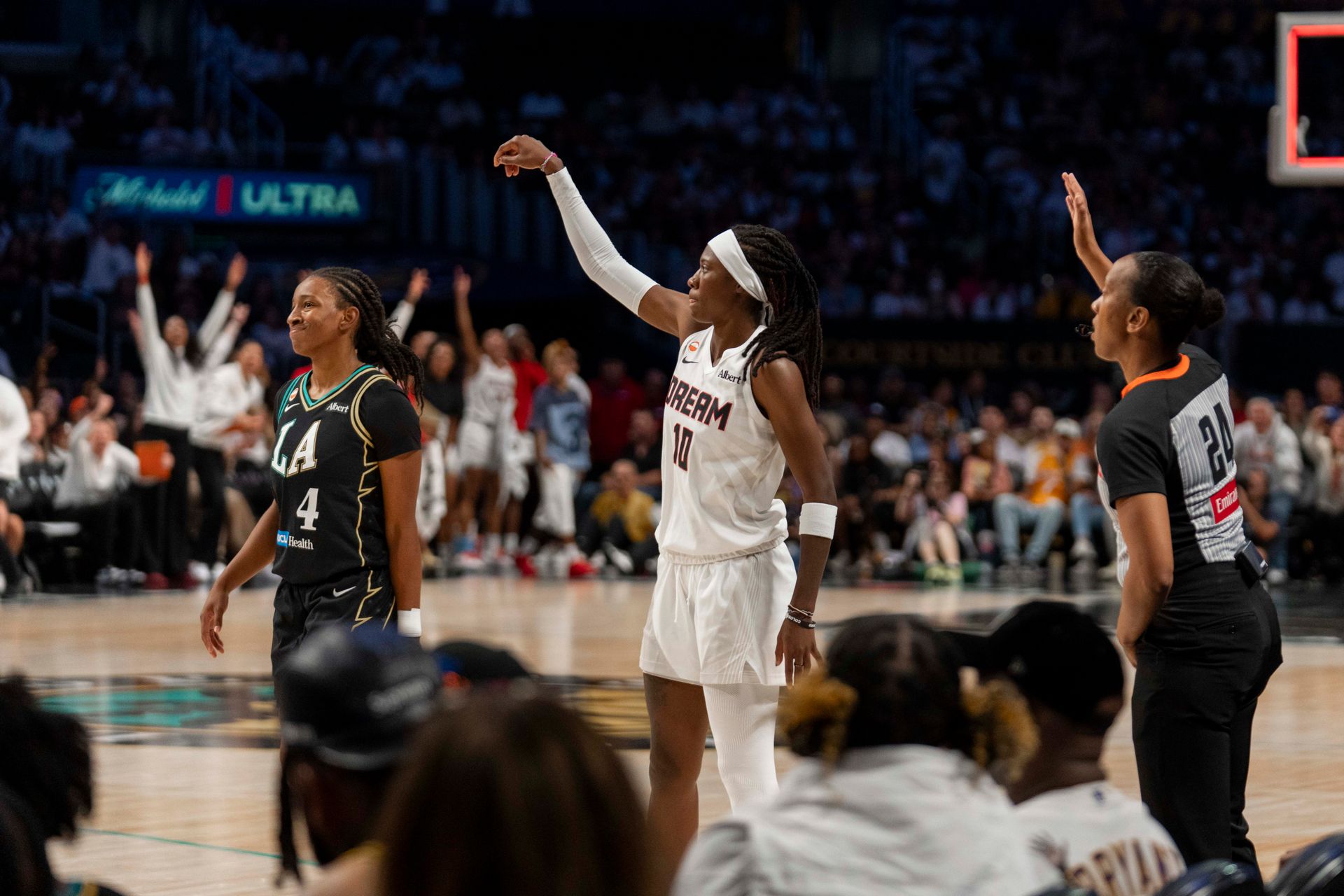 Rhyne Howard's buzzer-beater three-pointer electrifies the crowd.