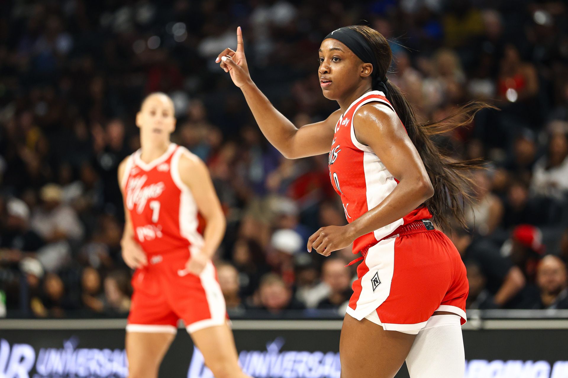 Jackie Young scores during Aces vs Sun game at Michelob ULTRA Arena
