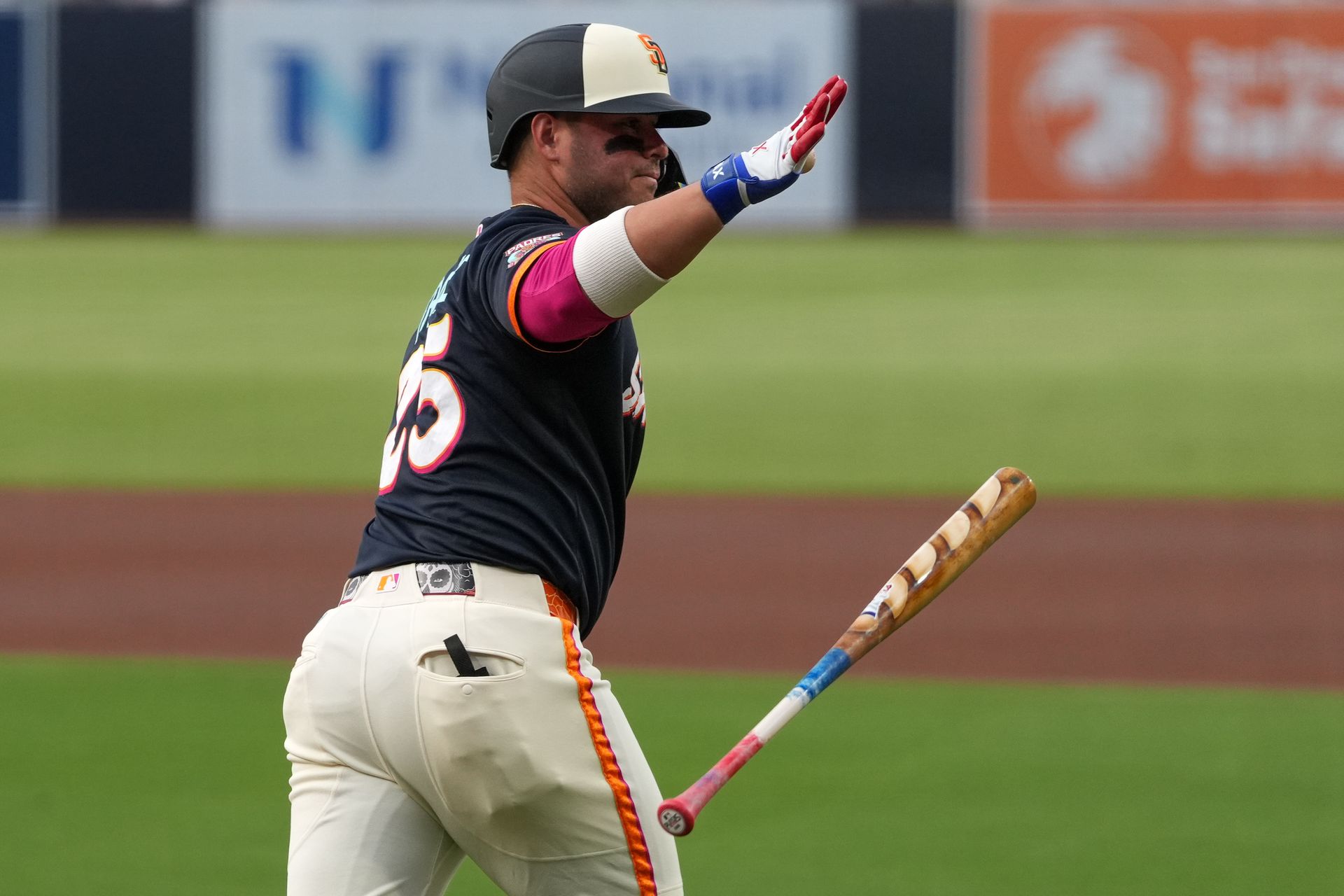 Ty France celebrates a home run against the Twins