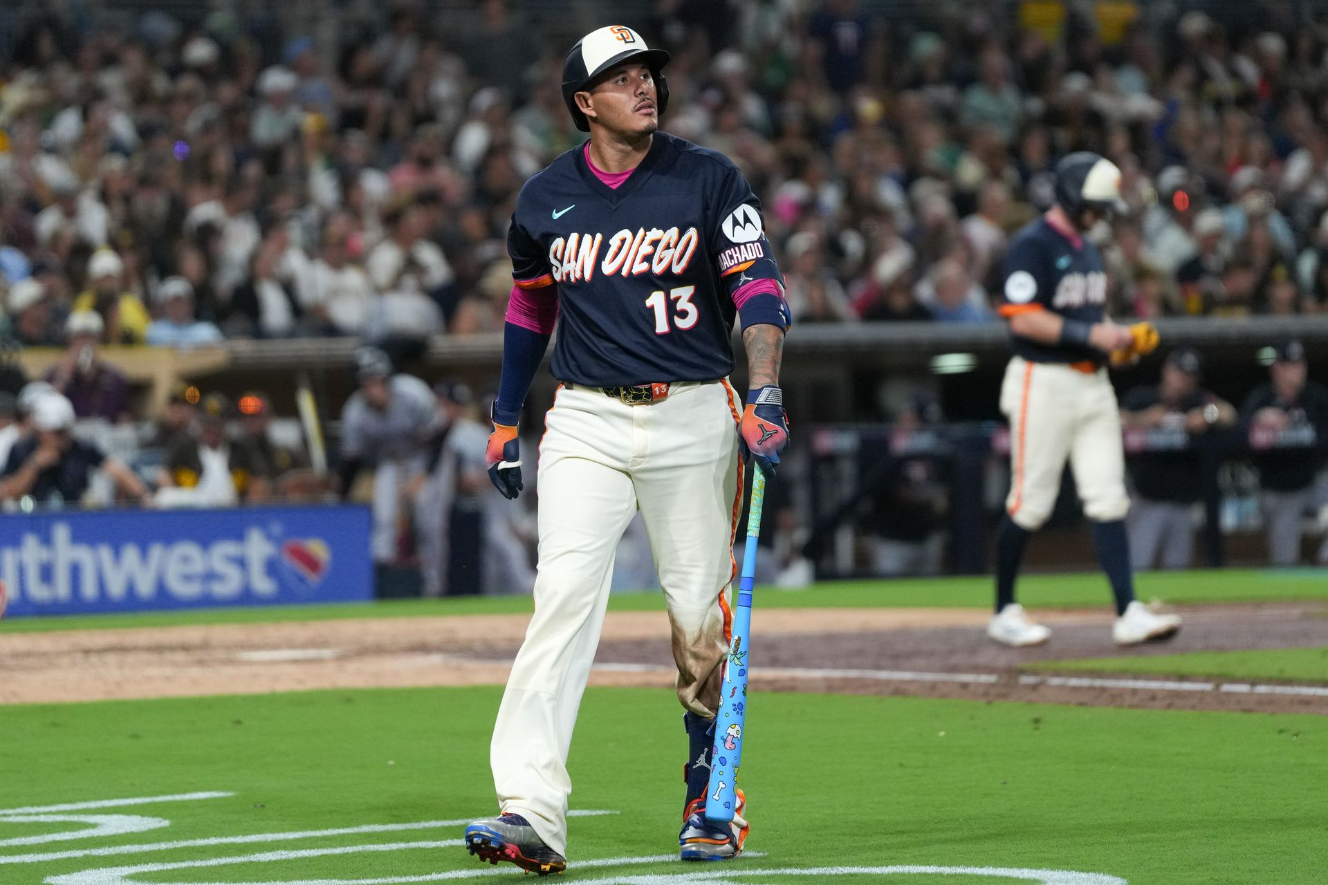 Manny Machado reacts after an out against the Twins