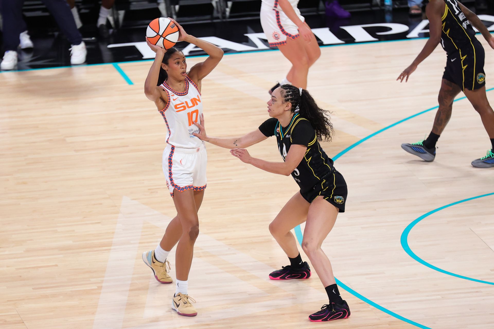 Dearica Hamby defends against Olivia Nelson-Ododa in WNBA action