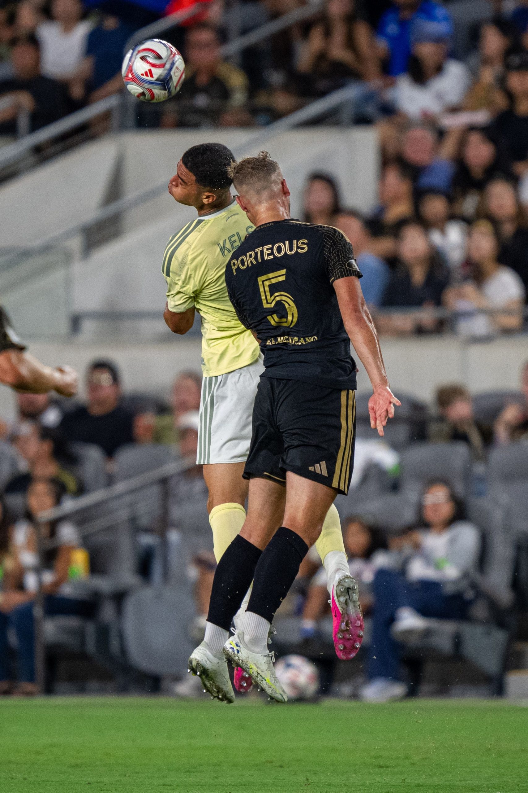 Ryan Porteous goes for a header against Timbers