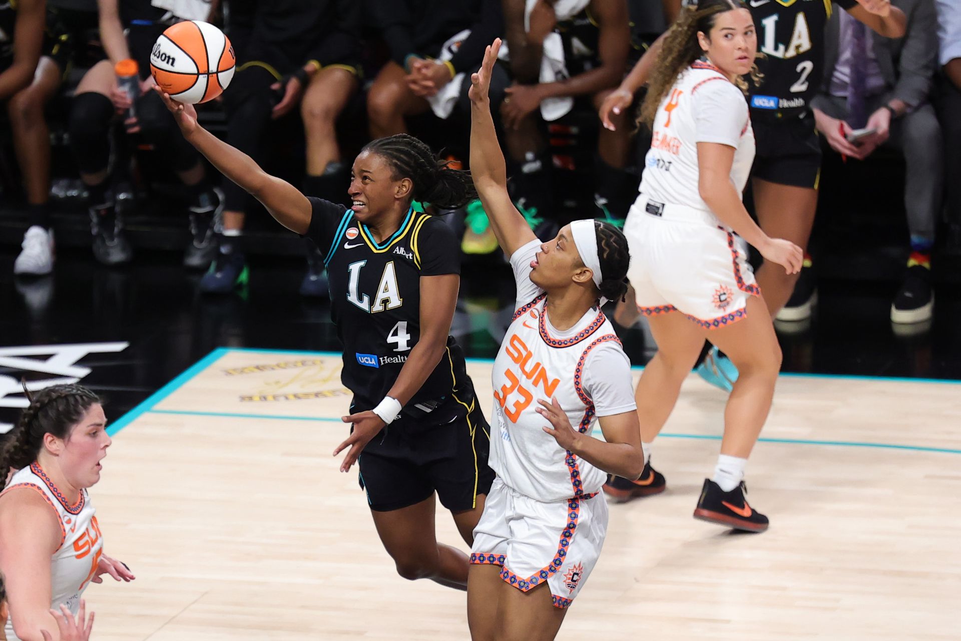 Tonie Morgan executes a layup against the Sun
