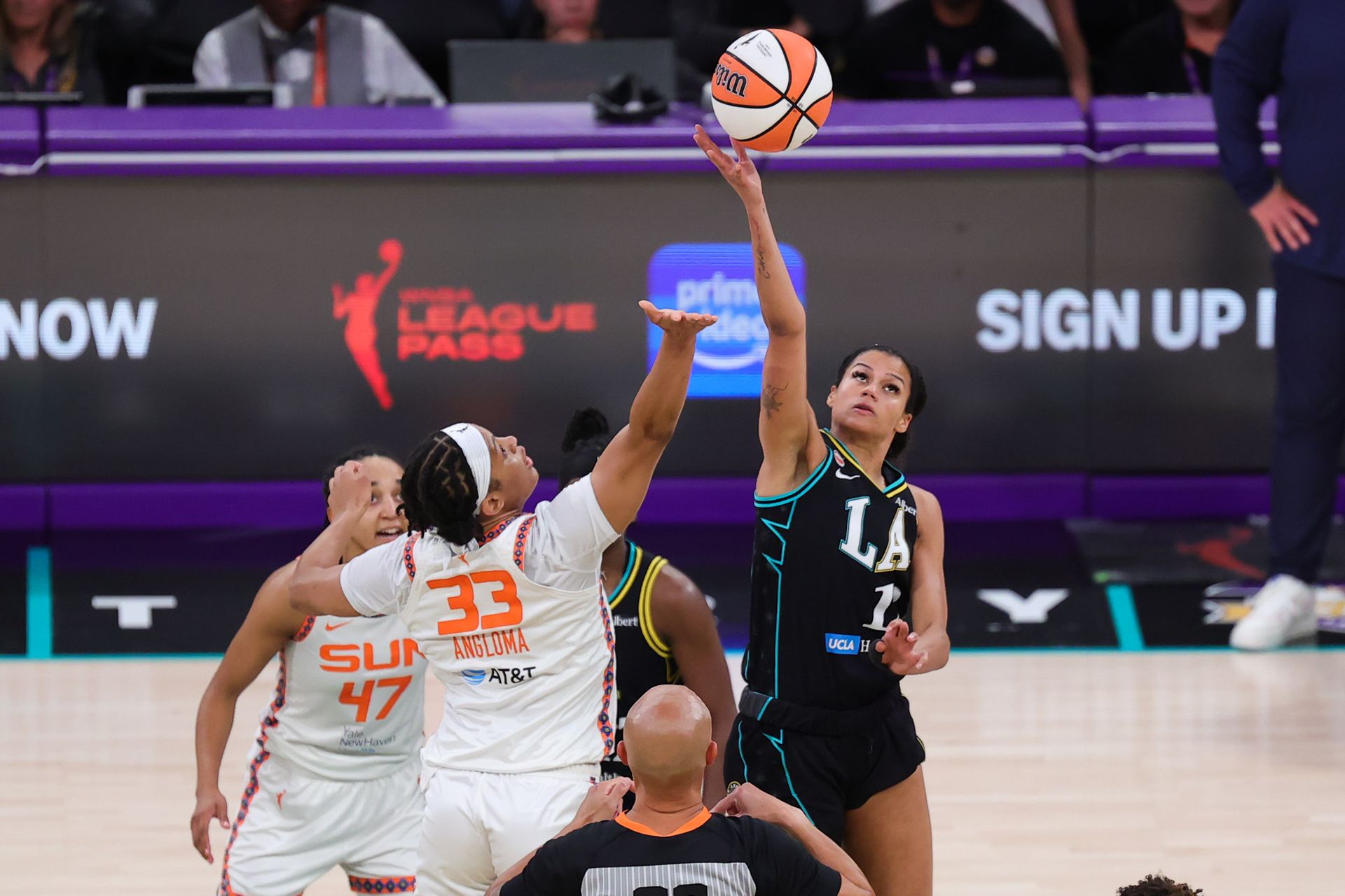 Rae Burrell and Nell Angloma in a jump ball showdown
