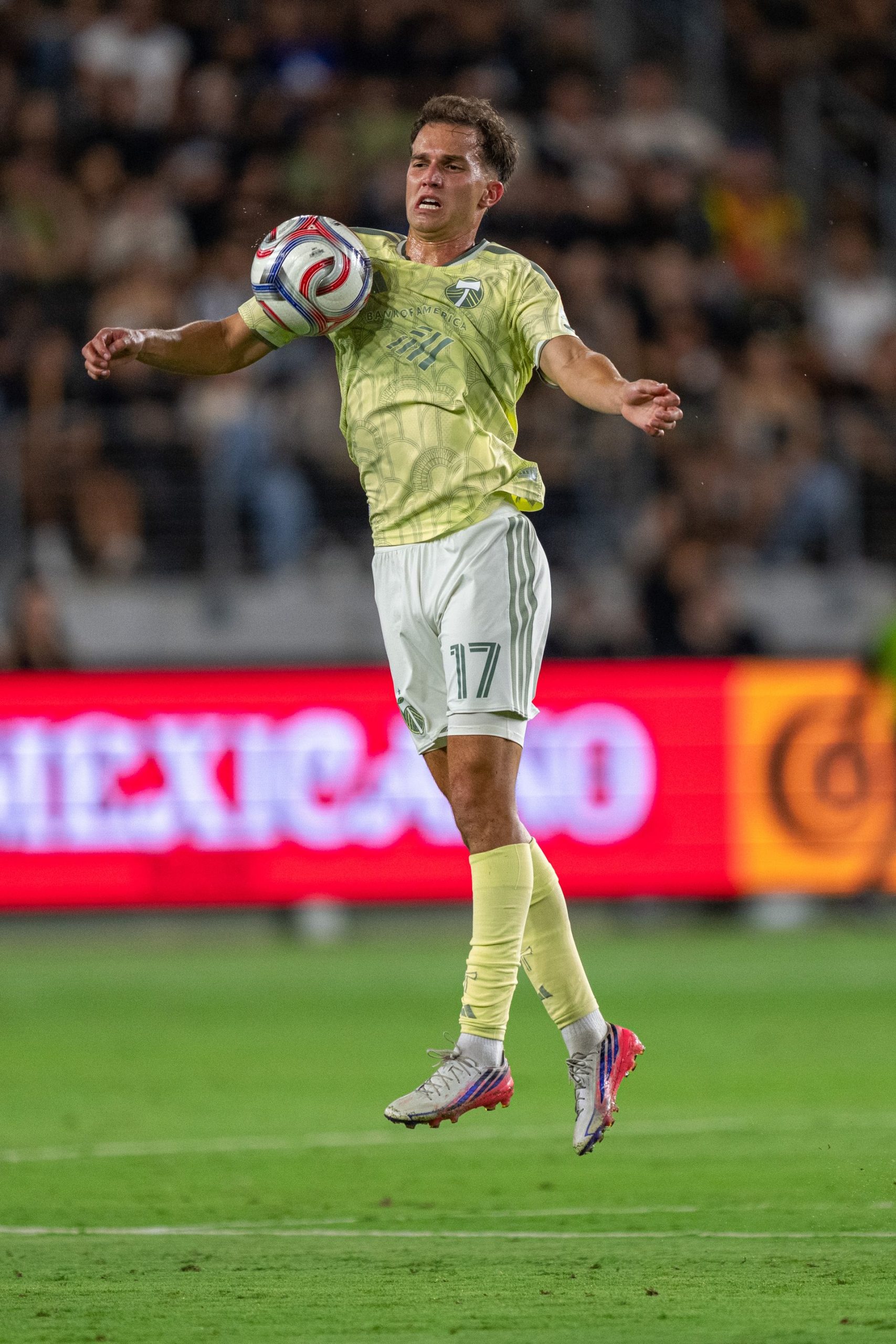Cole Bassett retrieves the ball for Timbers