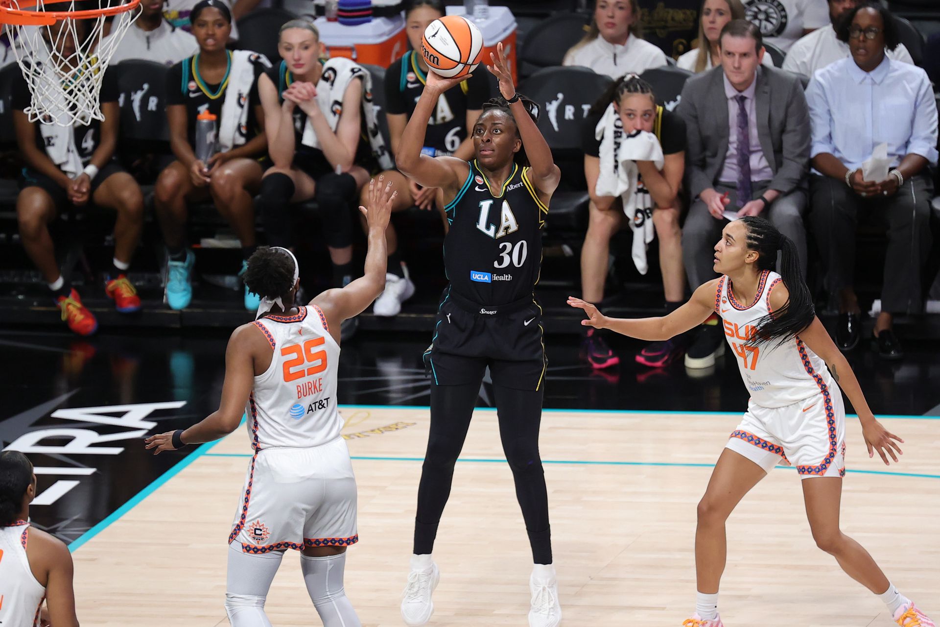 Nneka Ogwumike takes a shot in a tight WNBA contest