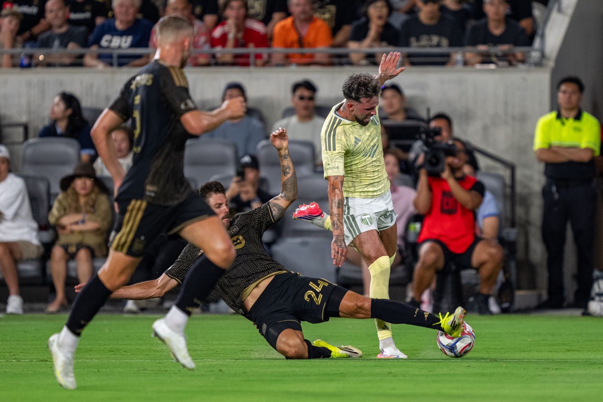 Ryan Hollingshead steals the ball in MLS match