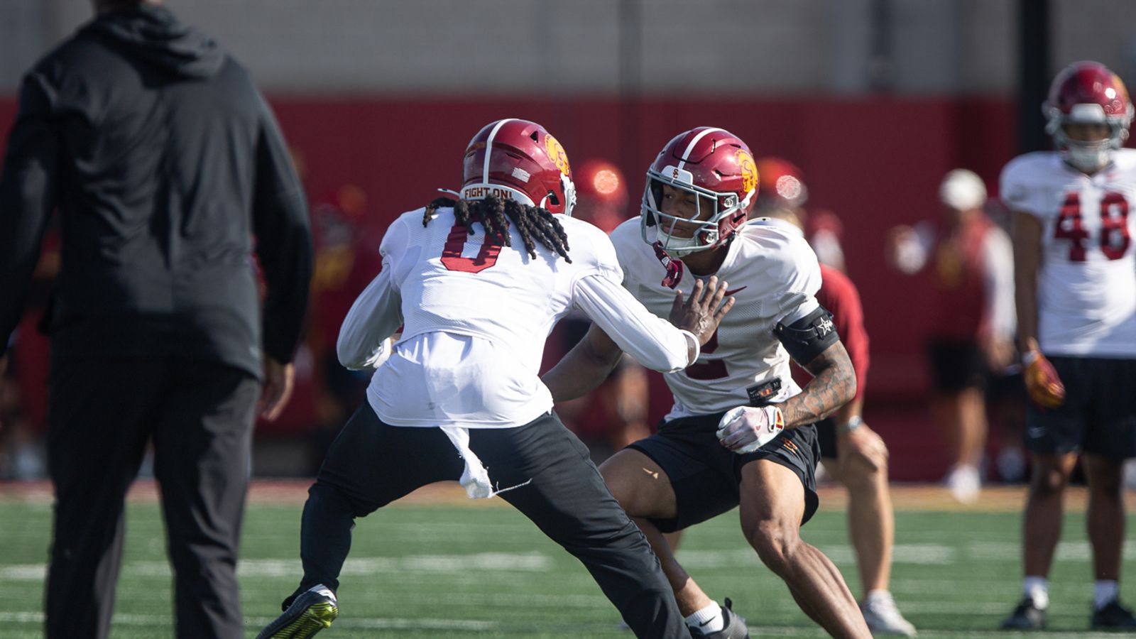 USC Players Running Drills on Field