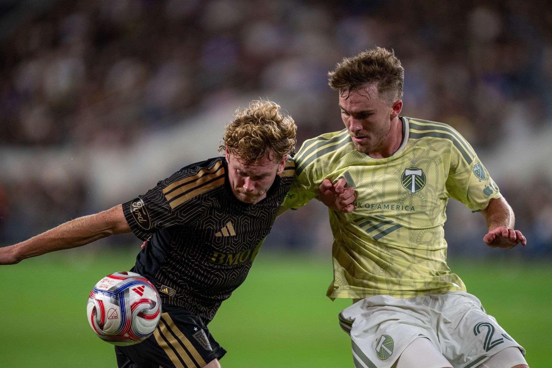 Jacob Shaffelburg fights for the ball in MLS game