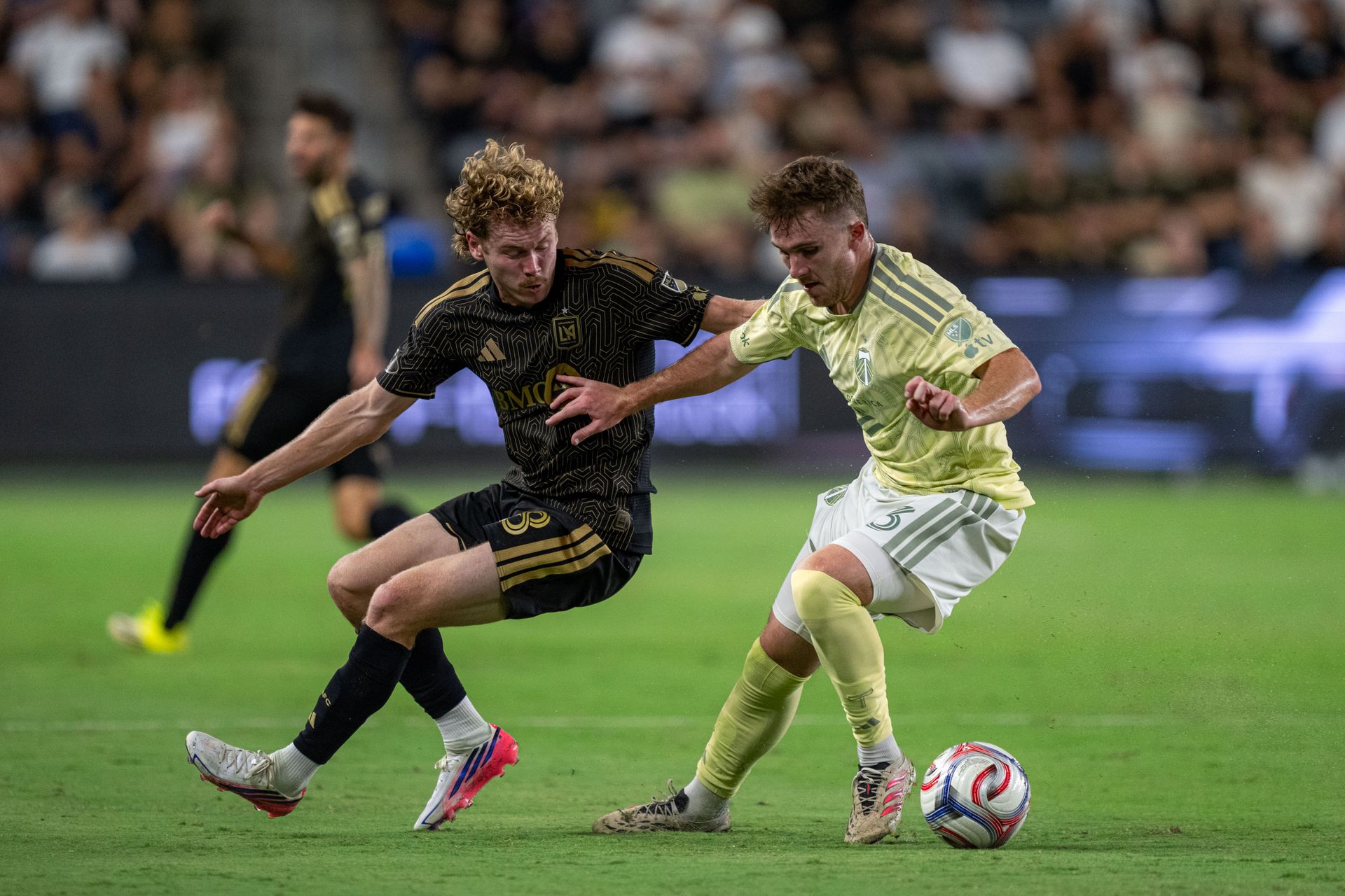 Jacob Shaffelburg contends for the ball again
