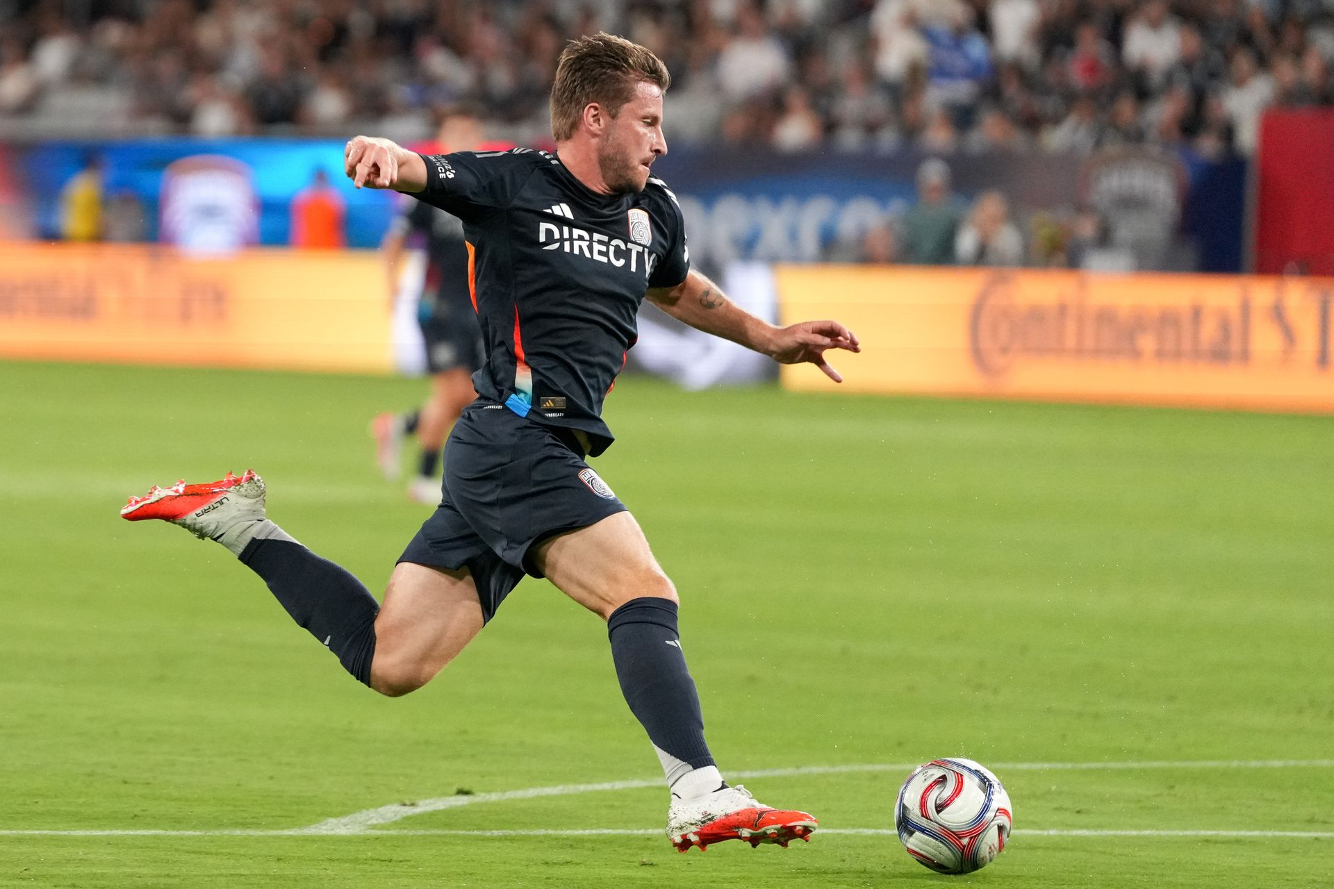 Anders Dreyer dribbles upfield against Colorado Rapids