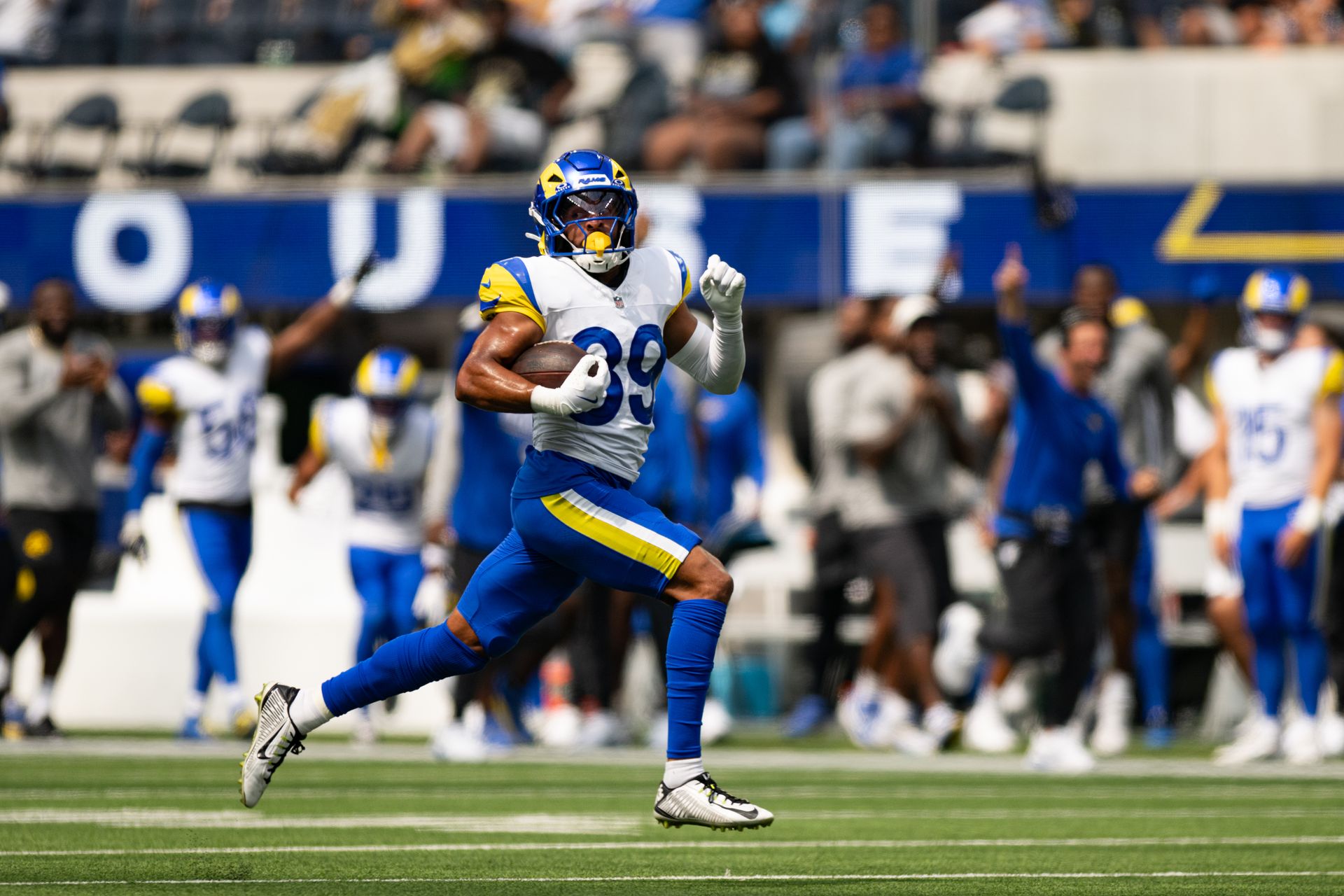Rams' Alex Cook dashes for a TD in preseason game against Saints