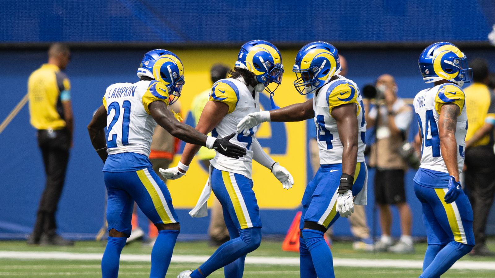 Cam Lampkin celebrates with Rams teammates during a preseason game against the Saints.