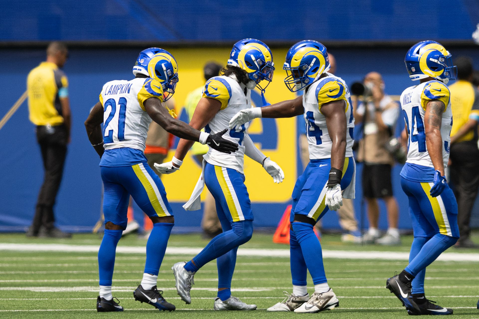 Rams' Cam Lampkin celebrates with teammates in preseason game