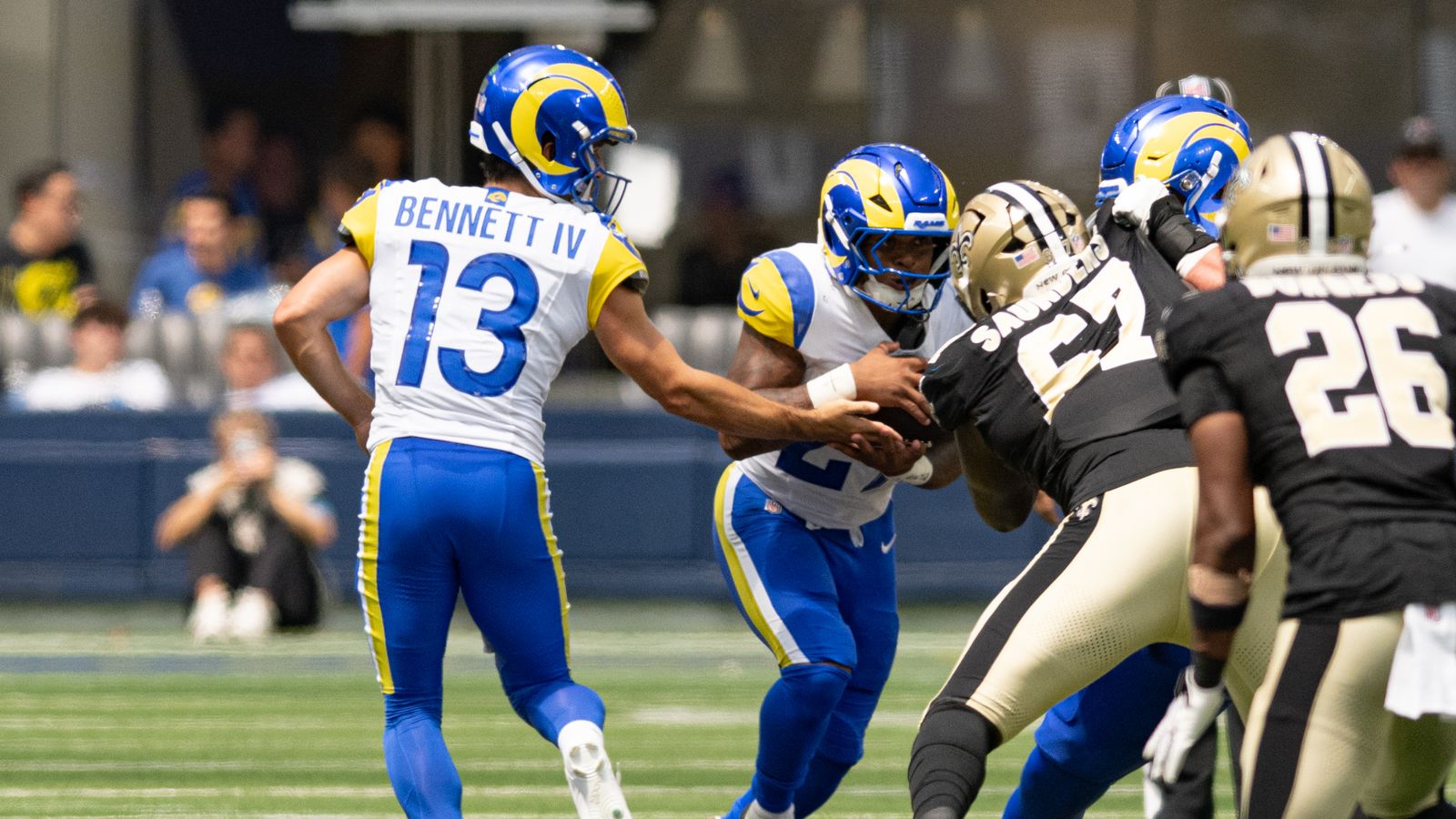 Stetson Bennett IV hands off the ball in a preseason clash with the Saints.