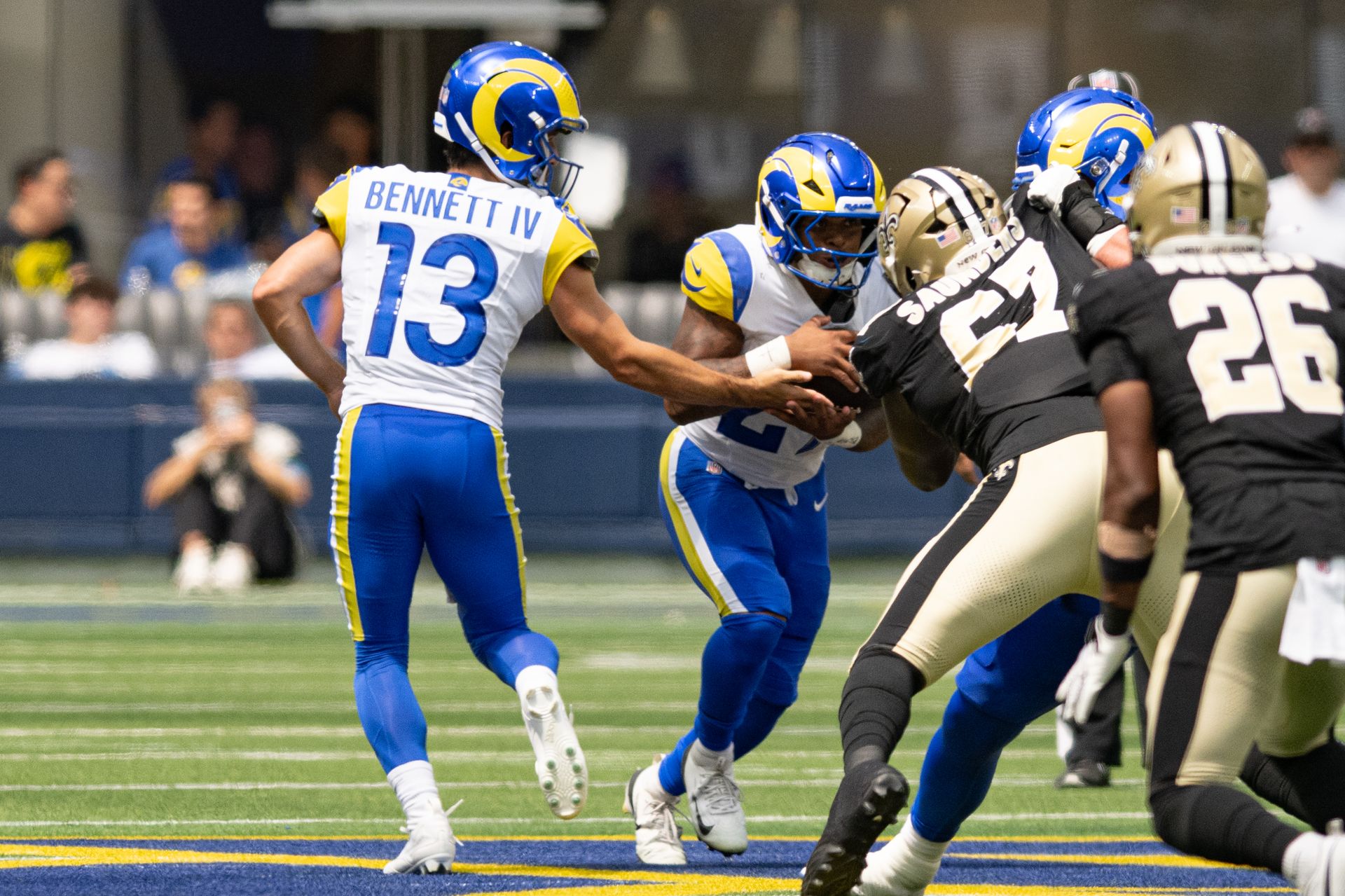 Rams QB Stetson Bennett IV hands off the ball in preseason game