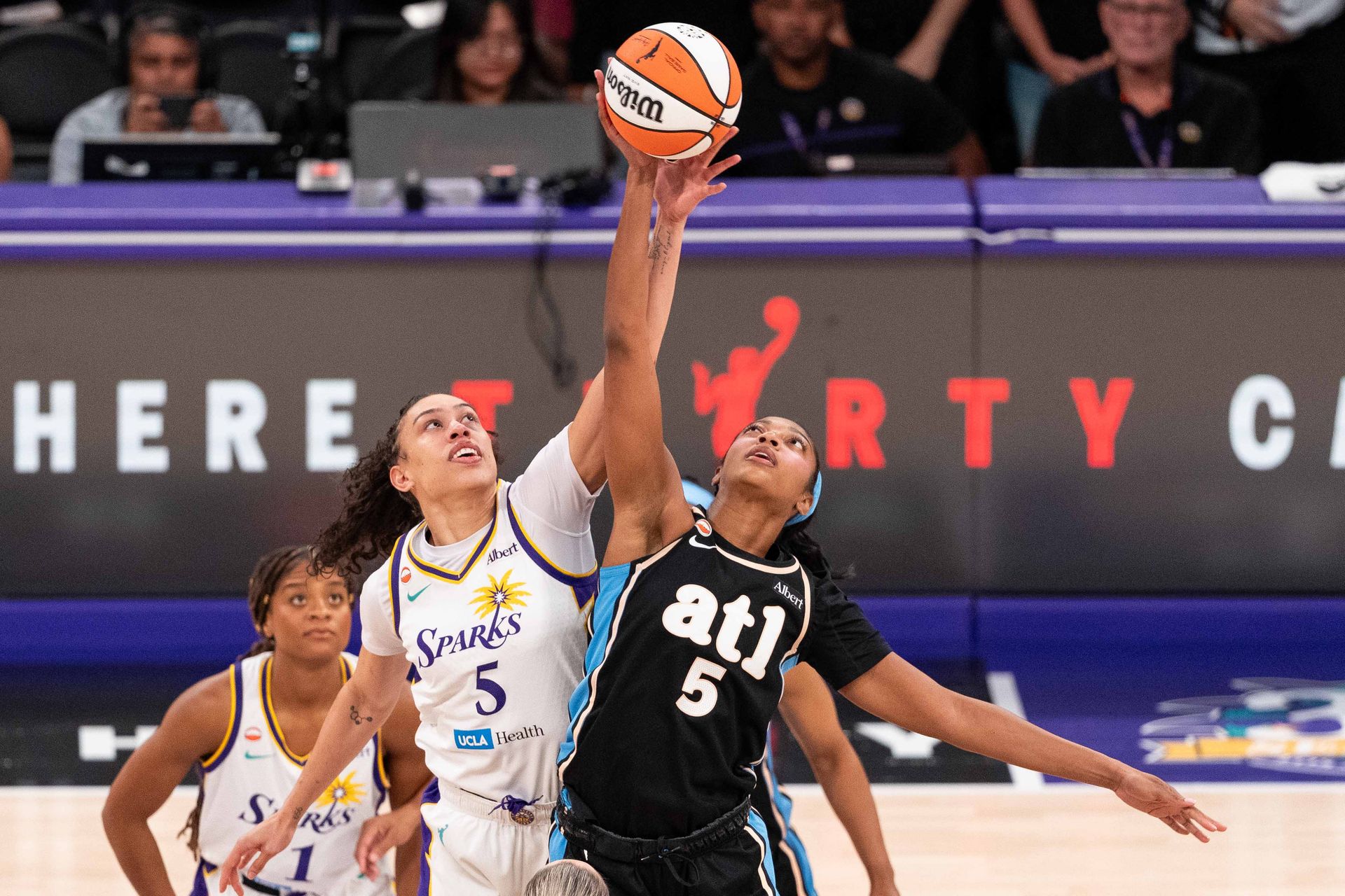 Dearica Hamby jumps for tip-off against the Atlanta Dream
