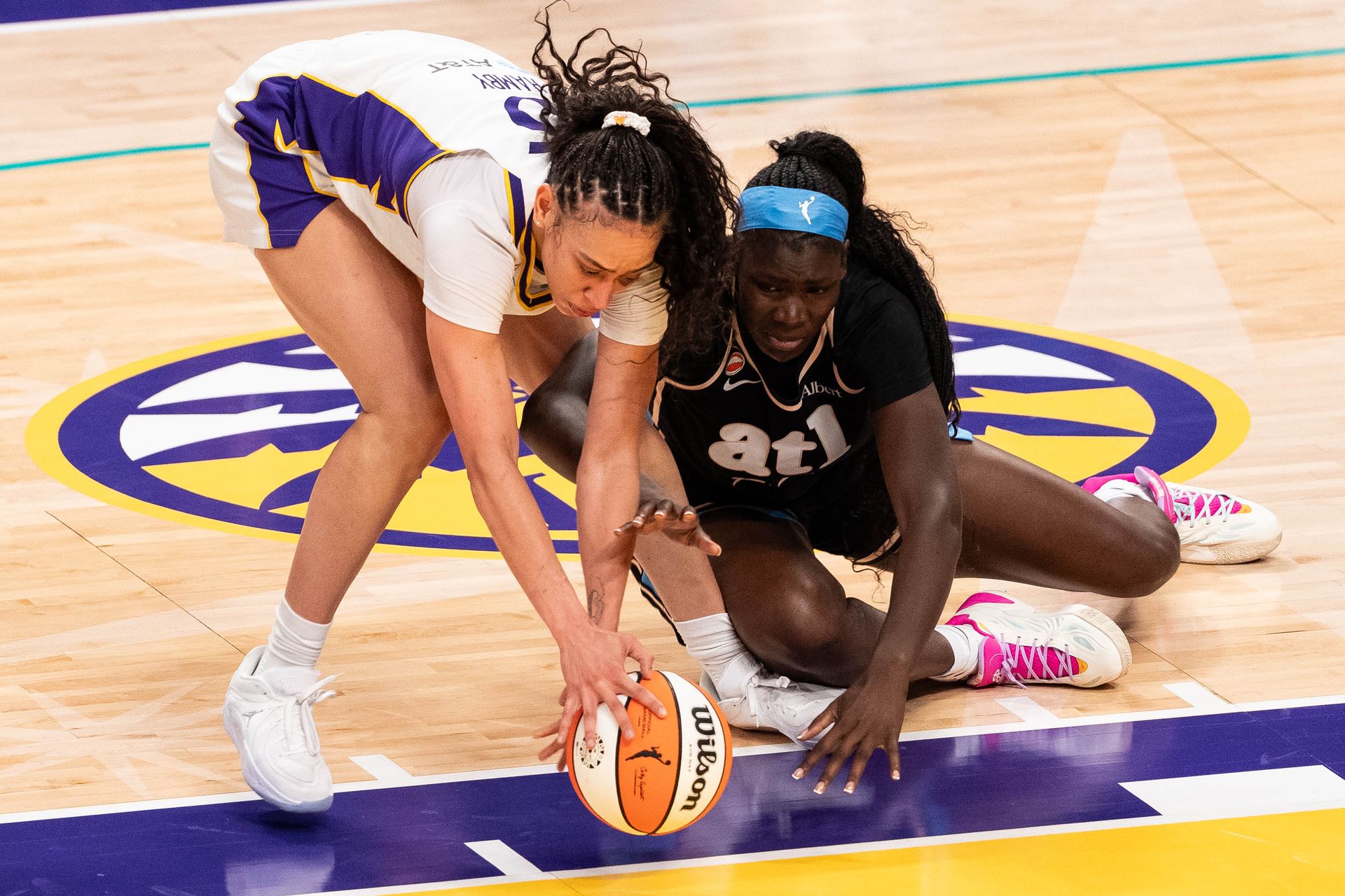 Dearica Hamby fights for possession in WNBA matchup