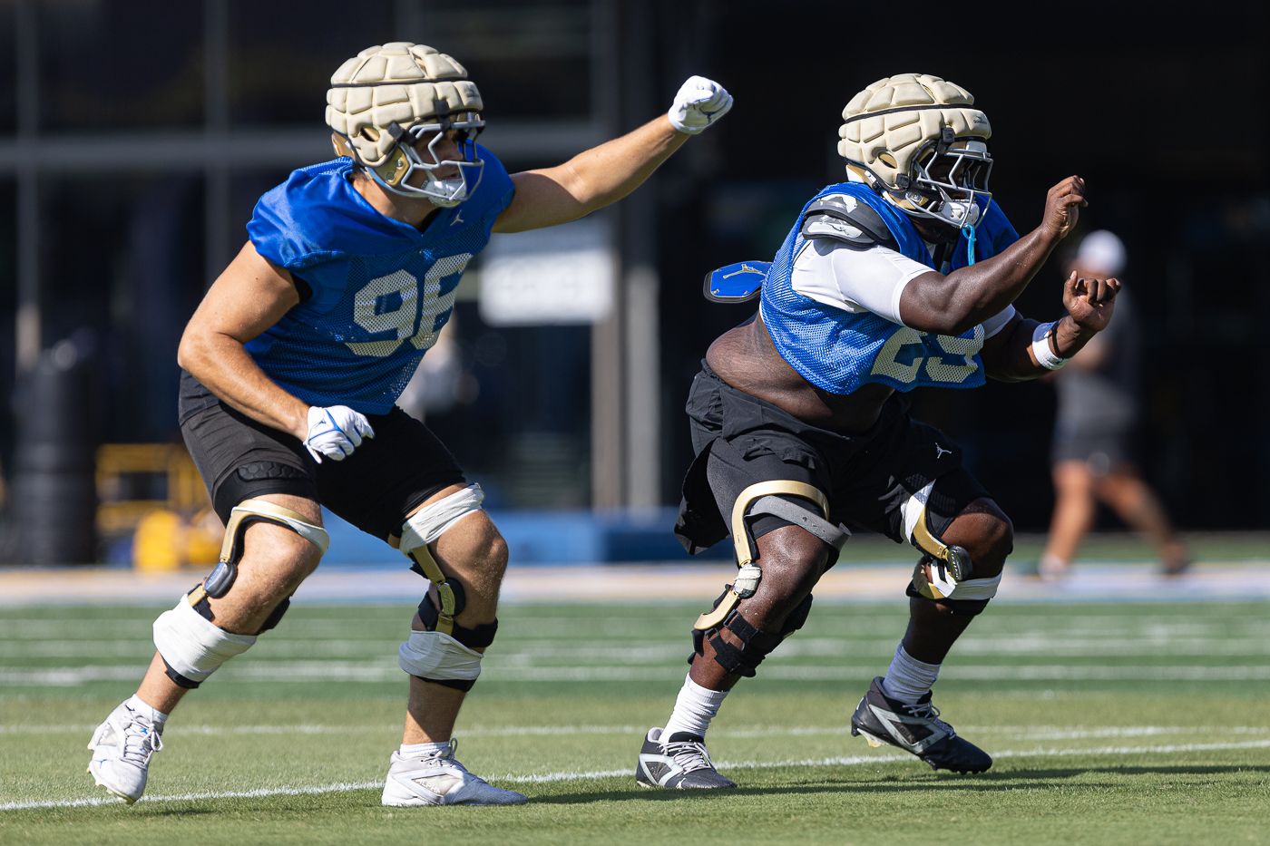 UCLA Linemen Engaged in Practice Drills