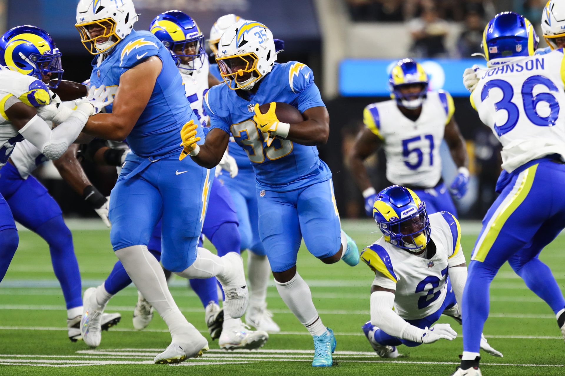 Amar Johnson charges with the ball in a preseason clash.