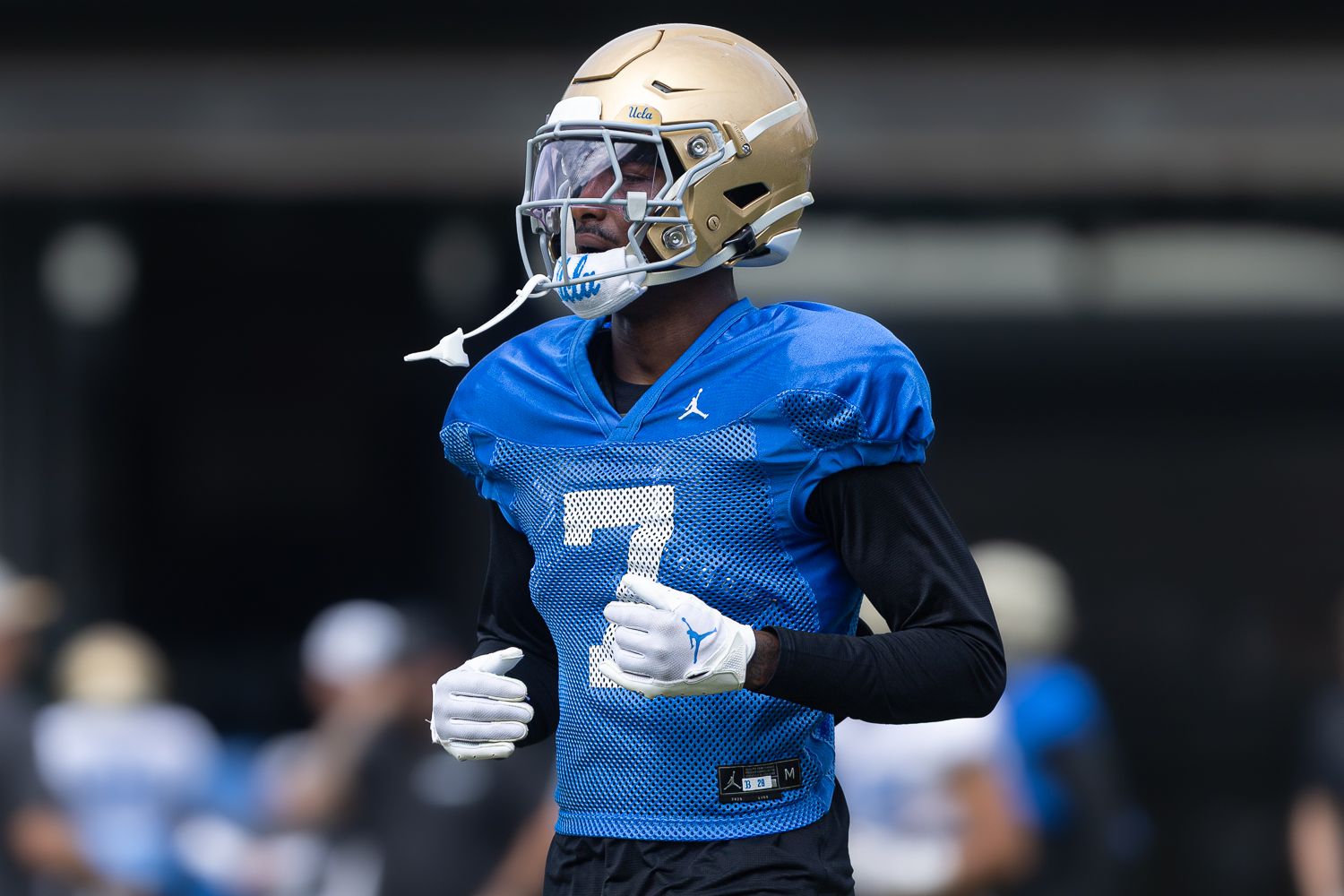 Aaron Williams (7) participates in UCLA practice