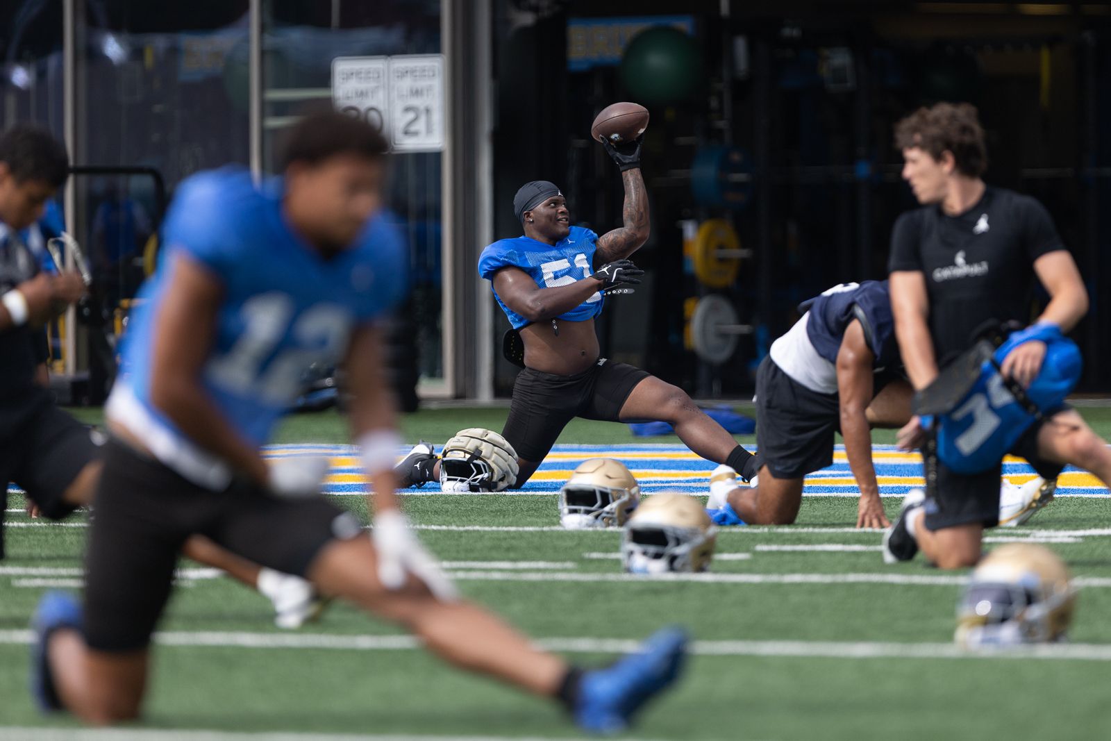 Trent Hendrick (51) in action at UCLA football practice
