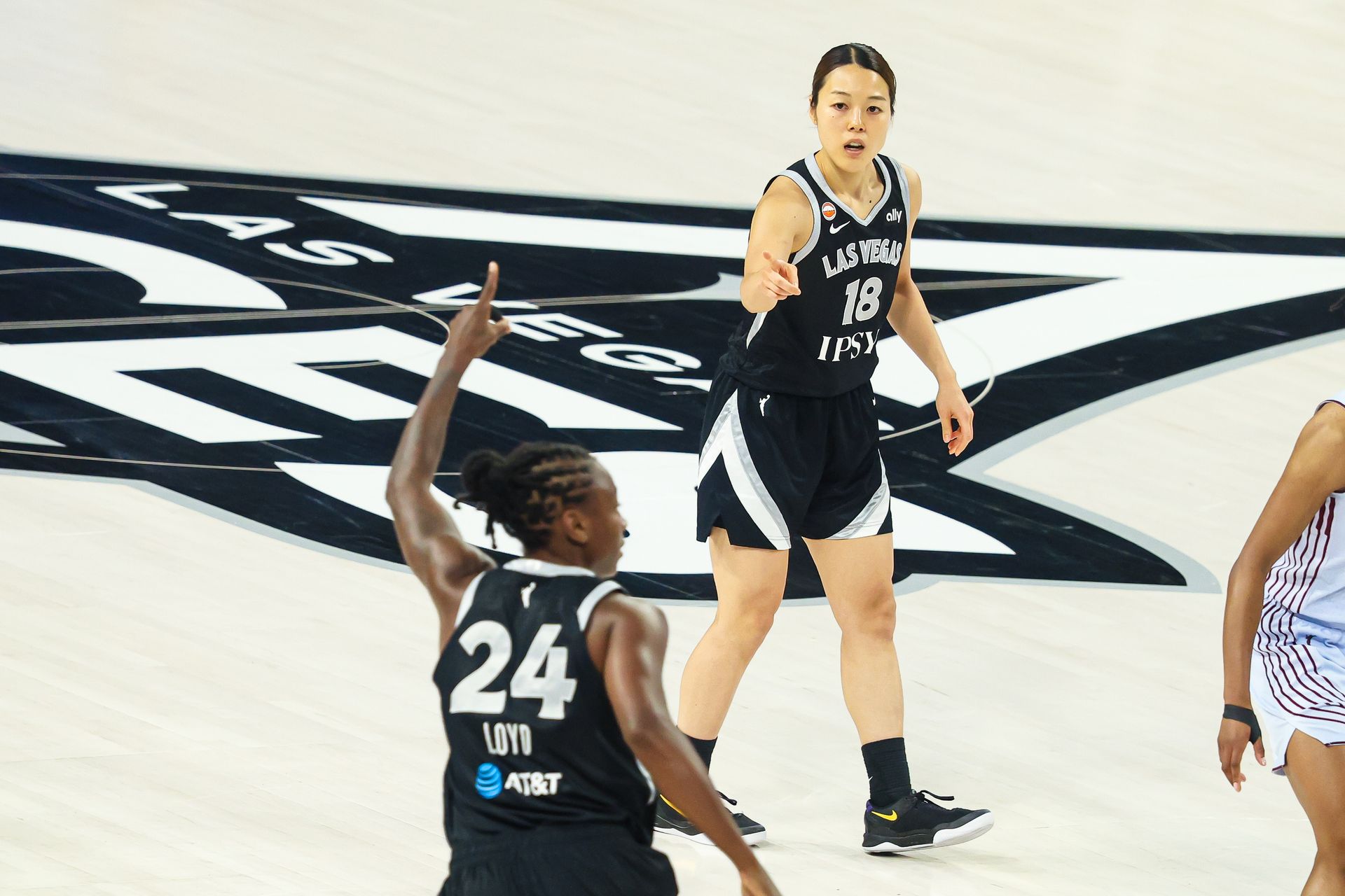 Mai Yamamoto points after an assist by Jewell Loyd against Toronto Tempo.
