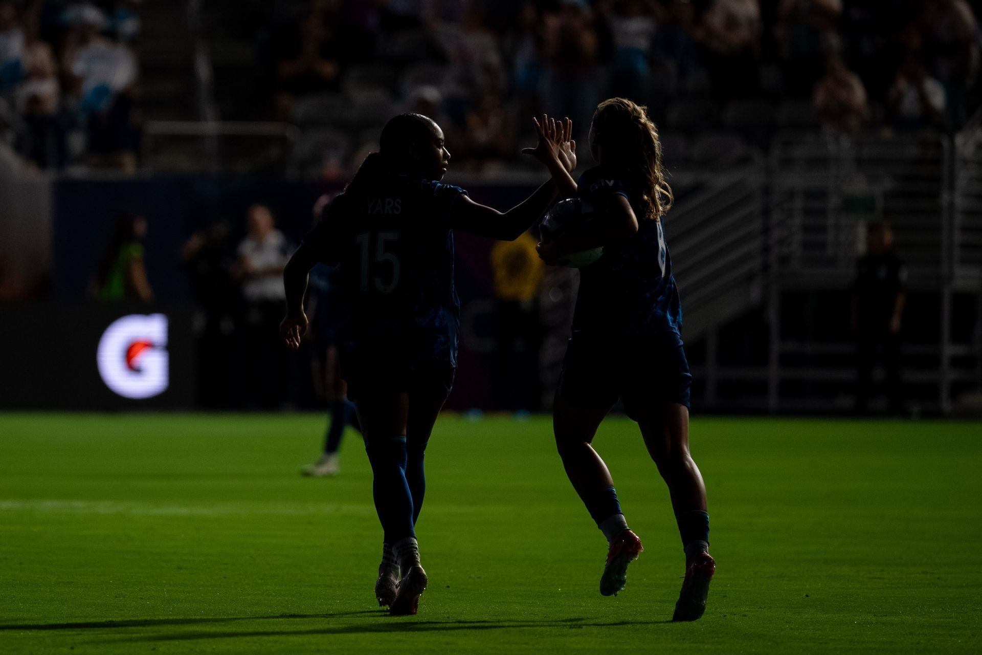 Trinity Byars and Kimmi Ascanio celebrate a goal in NWSL game