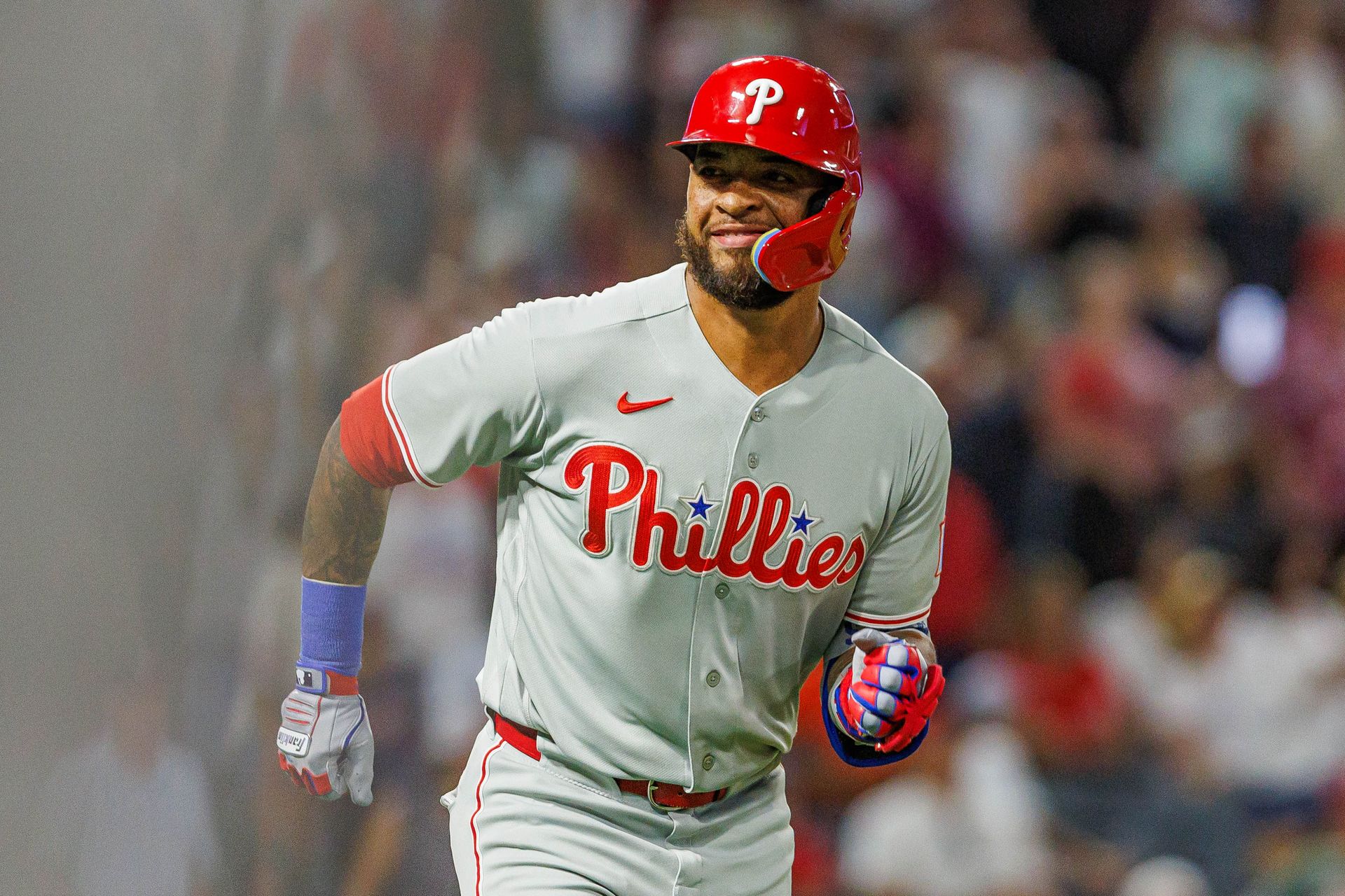 Edmundo Sosa #33 reacts to grand slam against the Angels in MLB game.