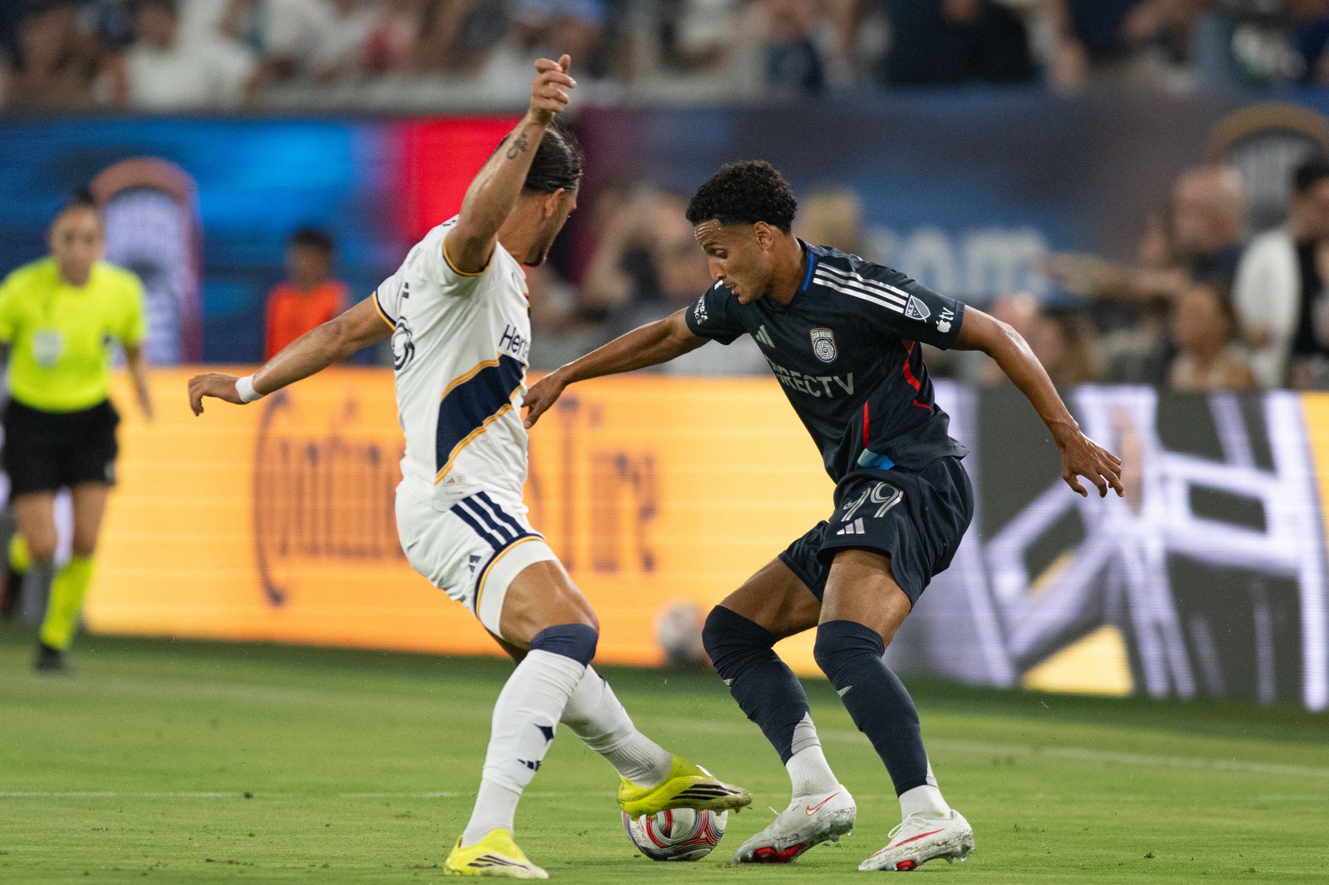 Elias Achouri dribbles past LA Galaxy defense