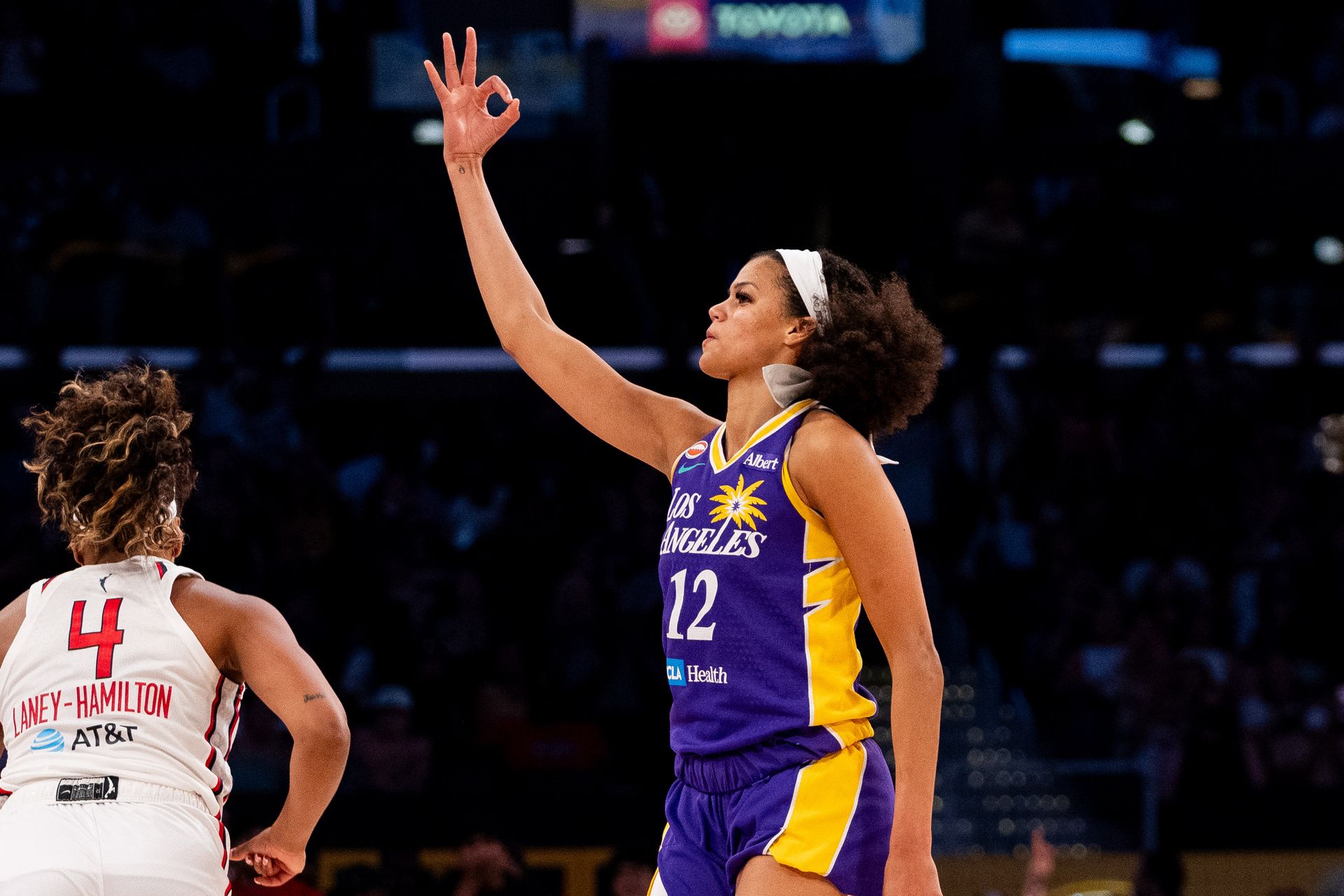 Rae Burrell Celebrates a Three-Pointer