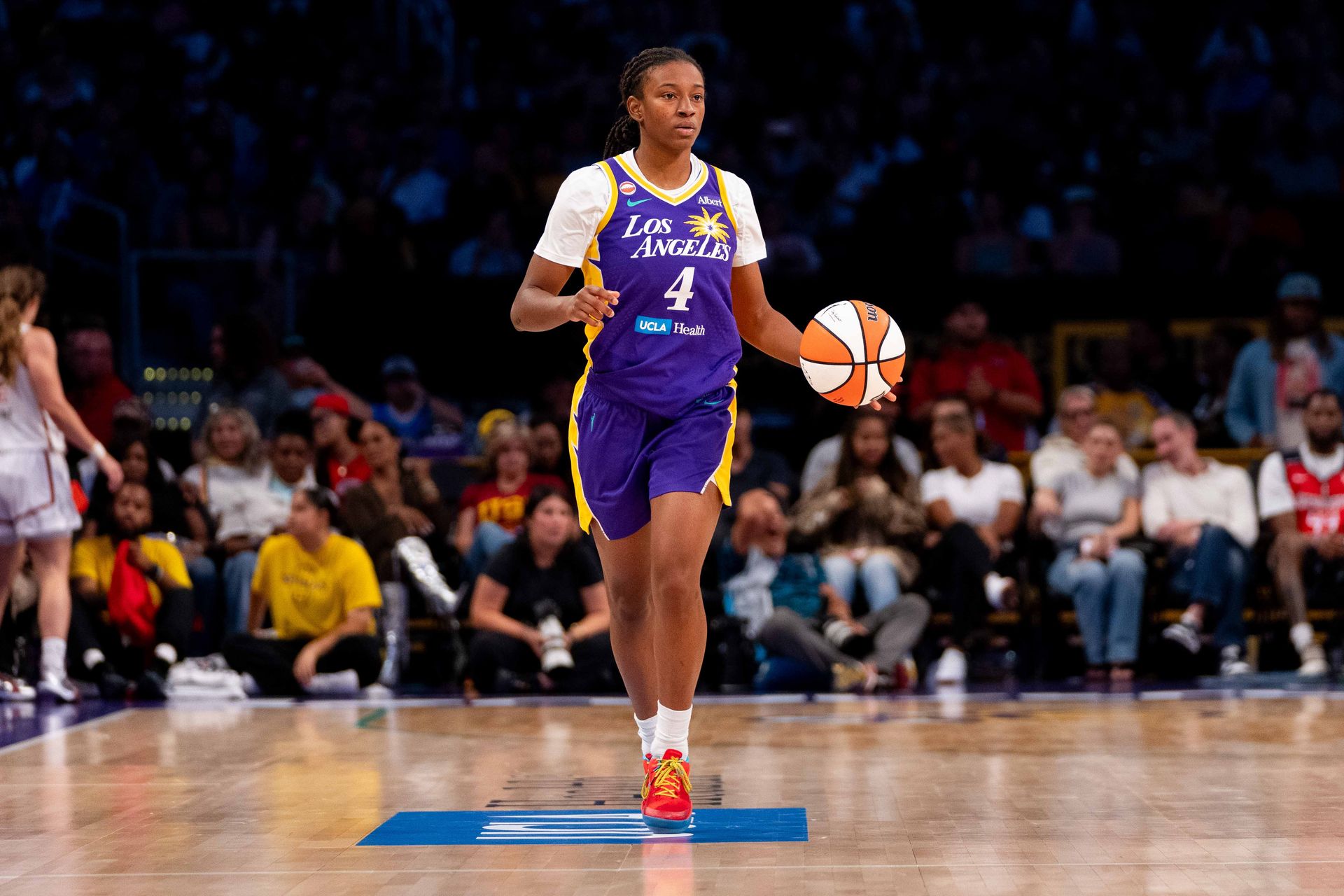 Tonie Morgan Dribbles Past Defense in WNBA Game