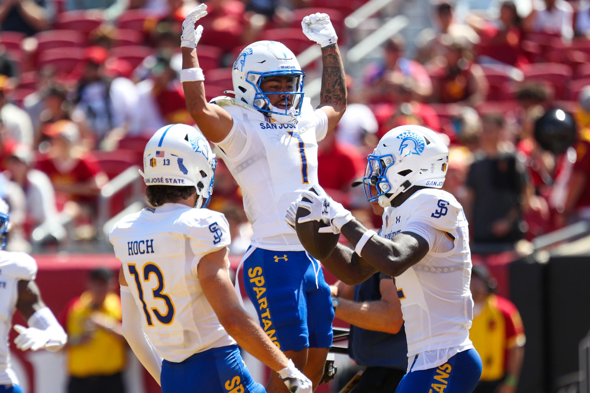 San Jose State players celebrate a touchdown against USC