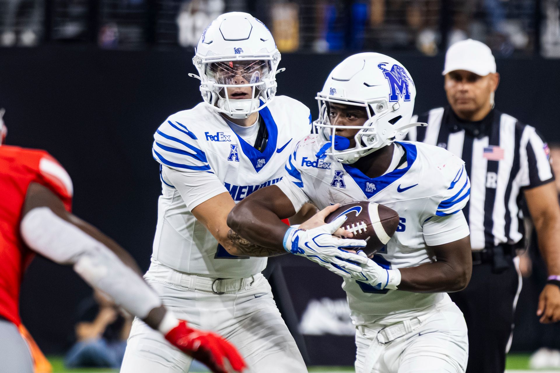 Marcus Stokes hands off to Jaylin Carter for a TD