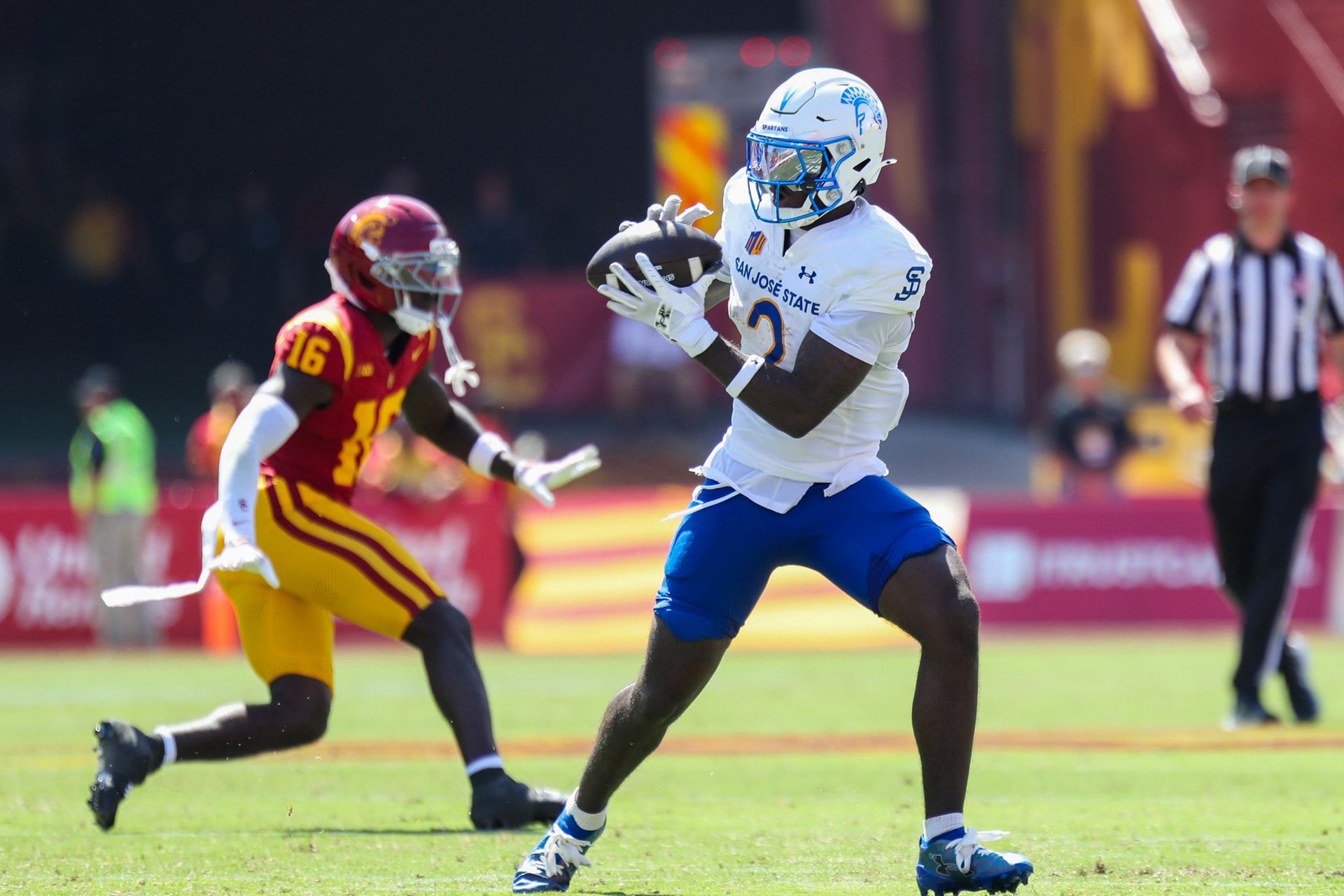 Jerry McClure (2) makes a catch for San Jose State against USC