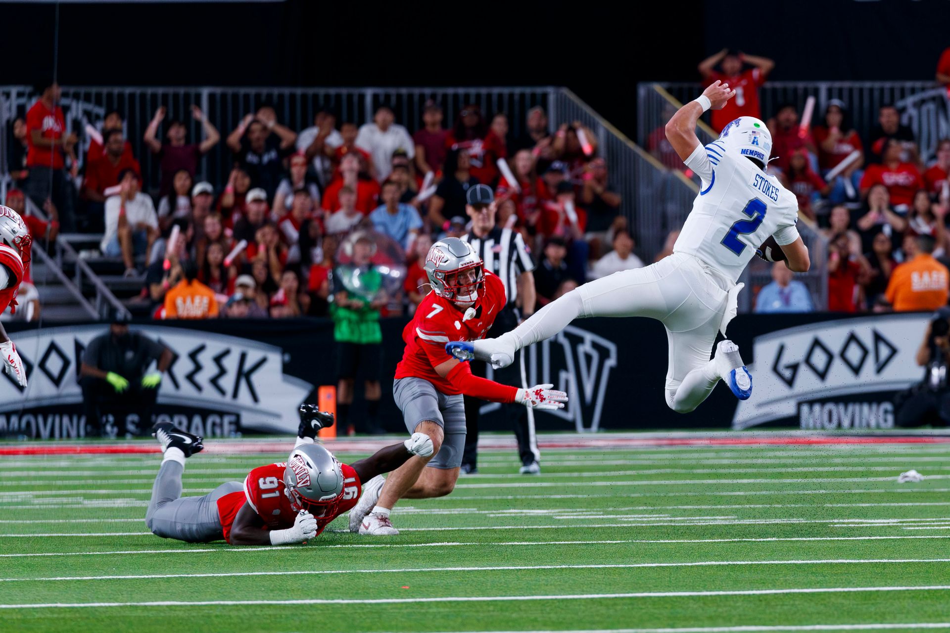 Elias Rudolph and Jake Pope tackle Memphis QB Marcus Stokes