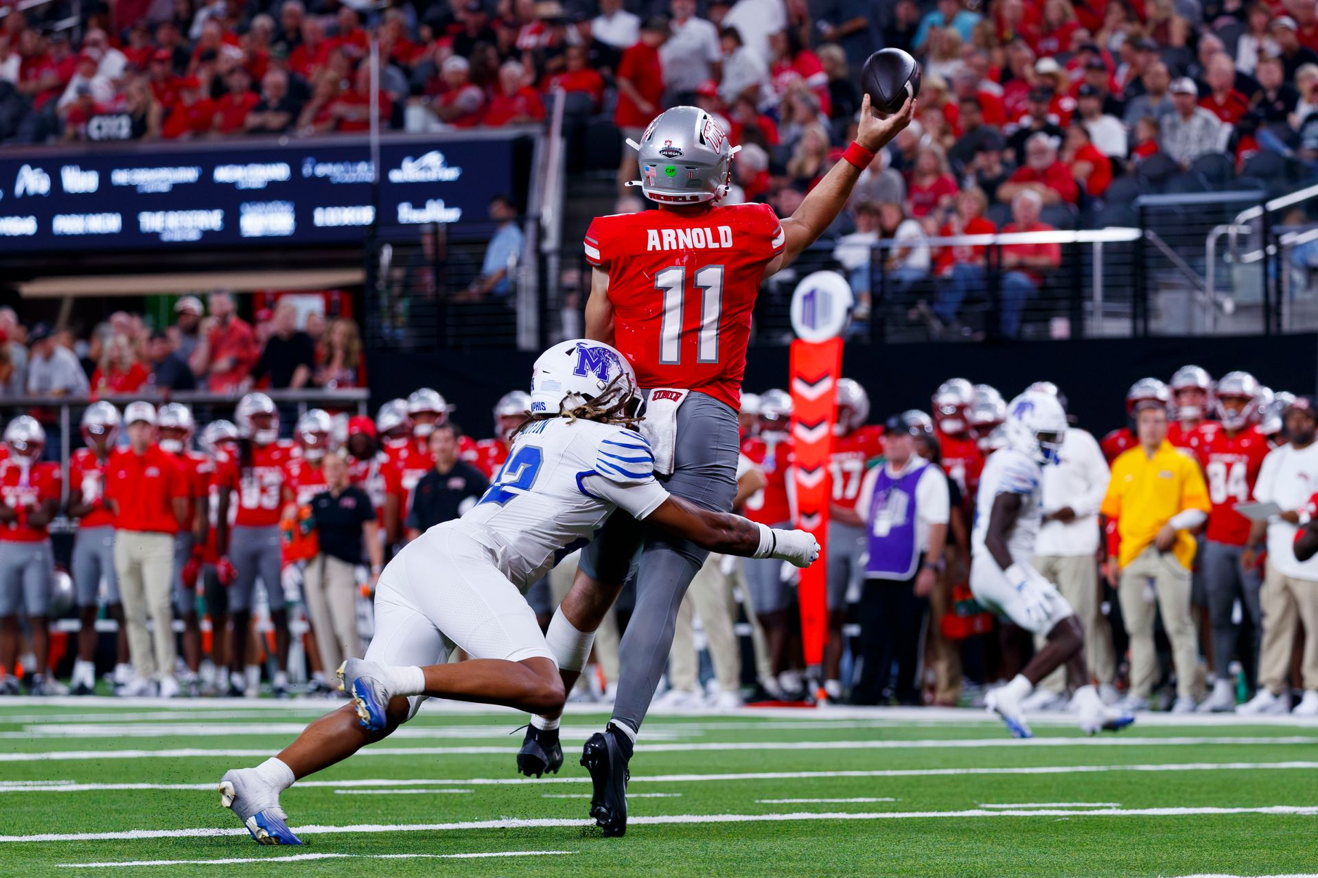 Jackson Arnold throws under pressure against Memphis